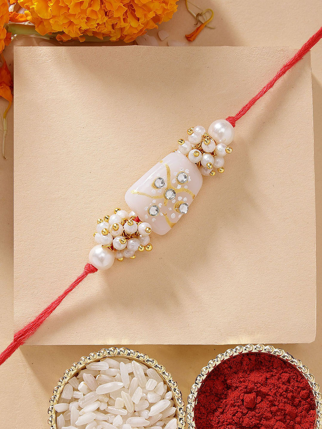 KARATCART White Tumble Rakhi with Roli Chawal