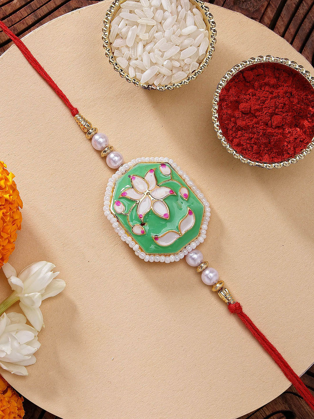 KARATCART Green Meenakari Lotus Design Rakhi with Roli Chawal
