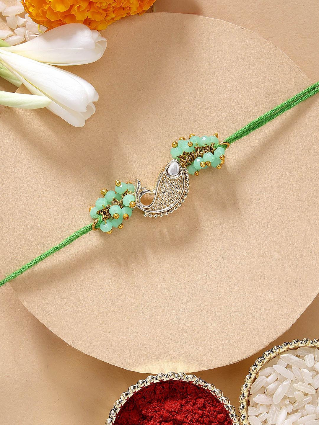 KARATCART Green Fish Shape Kundan Rakhi with Roli & Chawal