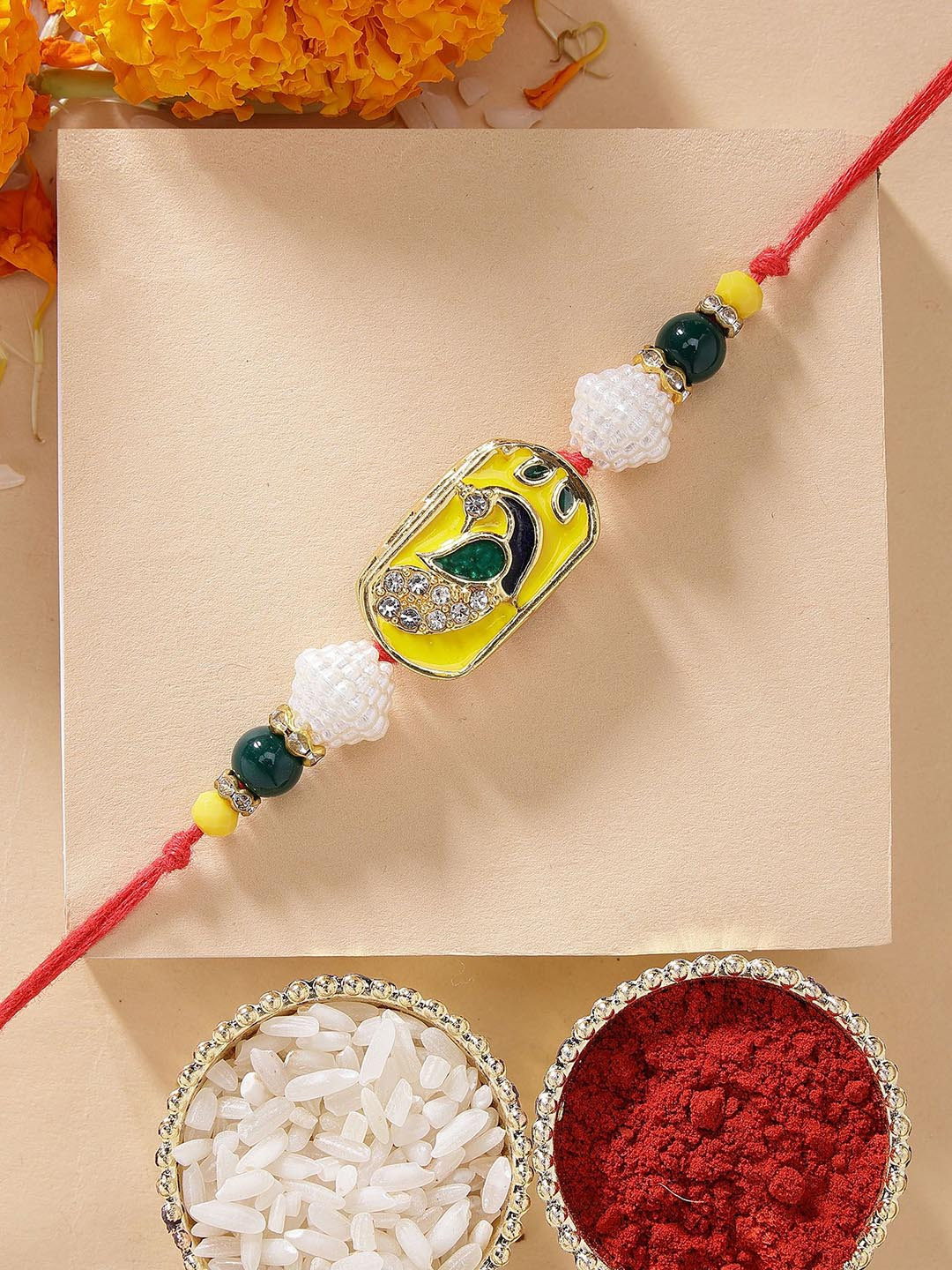 KARATCART Peacock Design Yellow Meenakari Rakhi with Roli Chawal