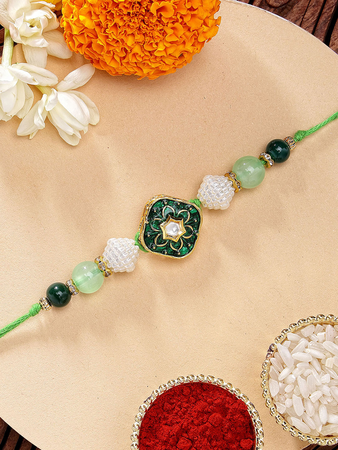 KARATCART Green Meena Floral Design Kundan Rakhi with Roli & Chawal