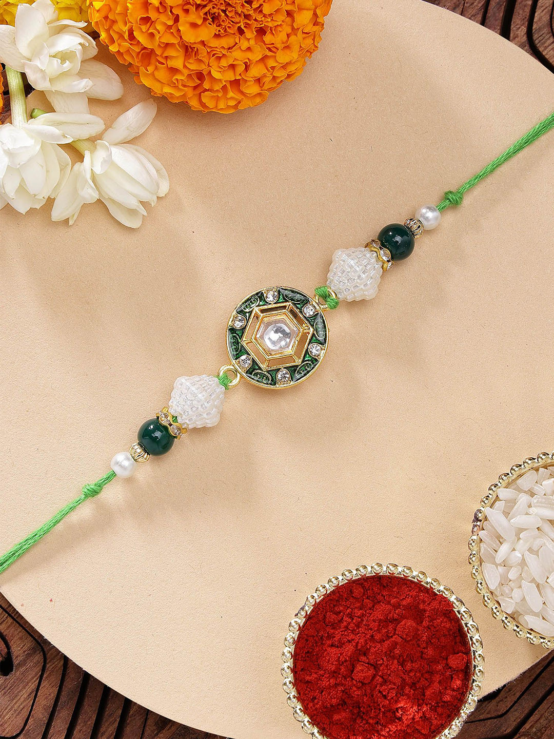 KARATCART Green Meena Hexagon Shape Kundan Rakhi with Roli & Chawal