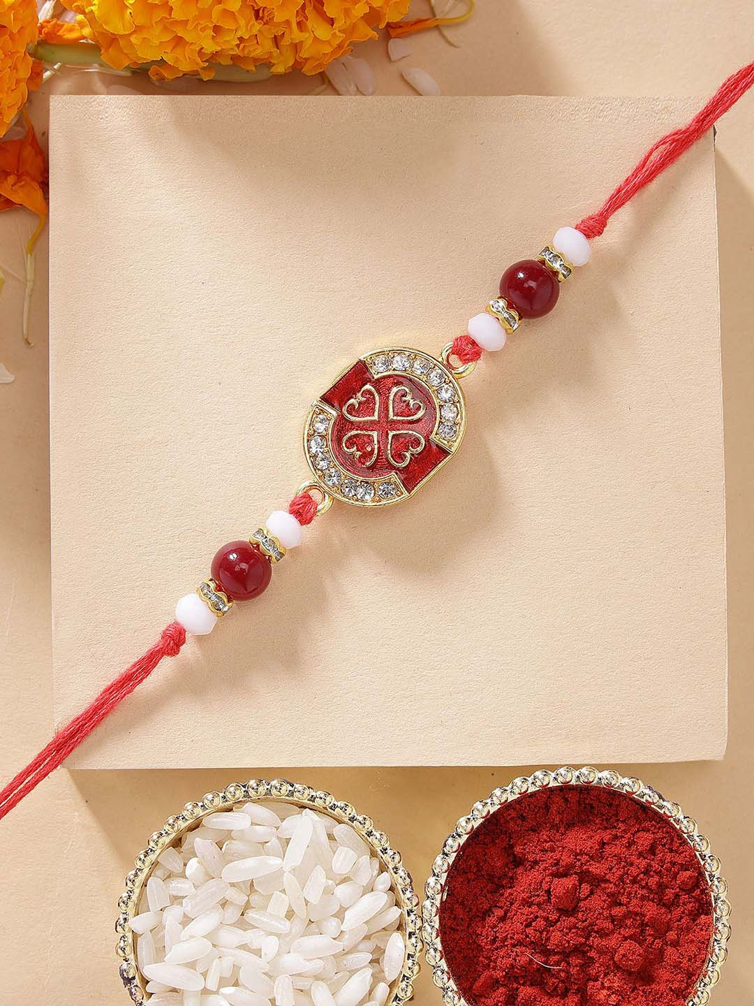 KARATCART Red Meena & Crystal Rakhi with Roli Chawal