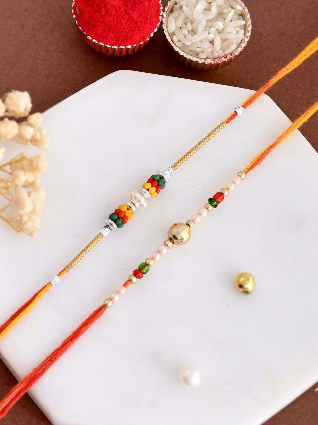 Aapno Rajasthan Set of 2 Beaded Thread Rakhis with Greetings Card & Roli Chawal