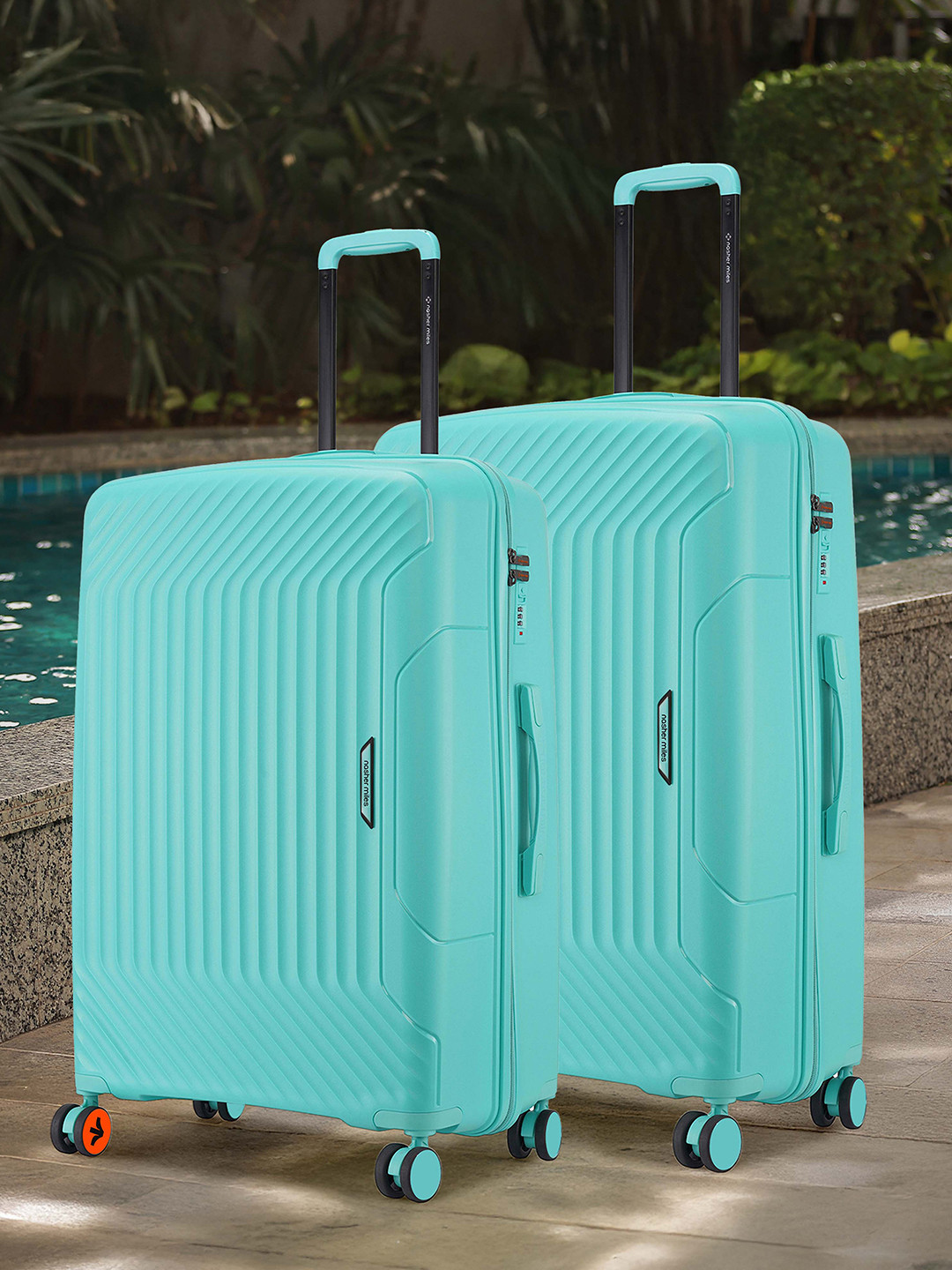 Nasher Miles Coorg Hard-Sided Polypropylene Set of 2 M/L Teal Trolley Bags 65-75cm