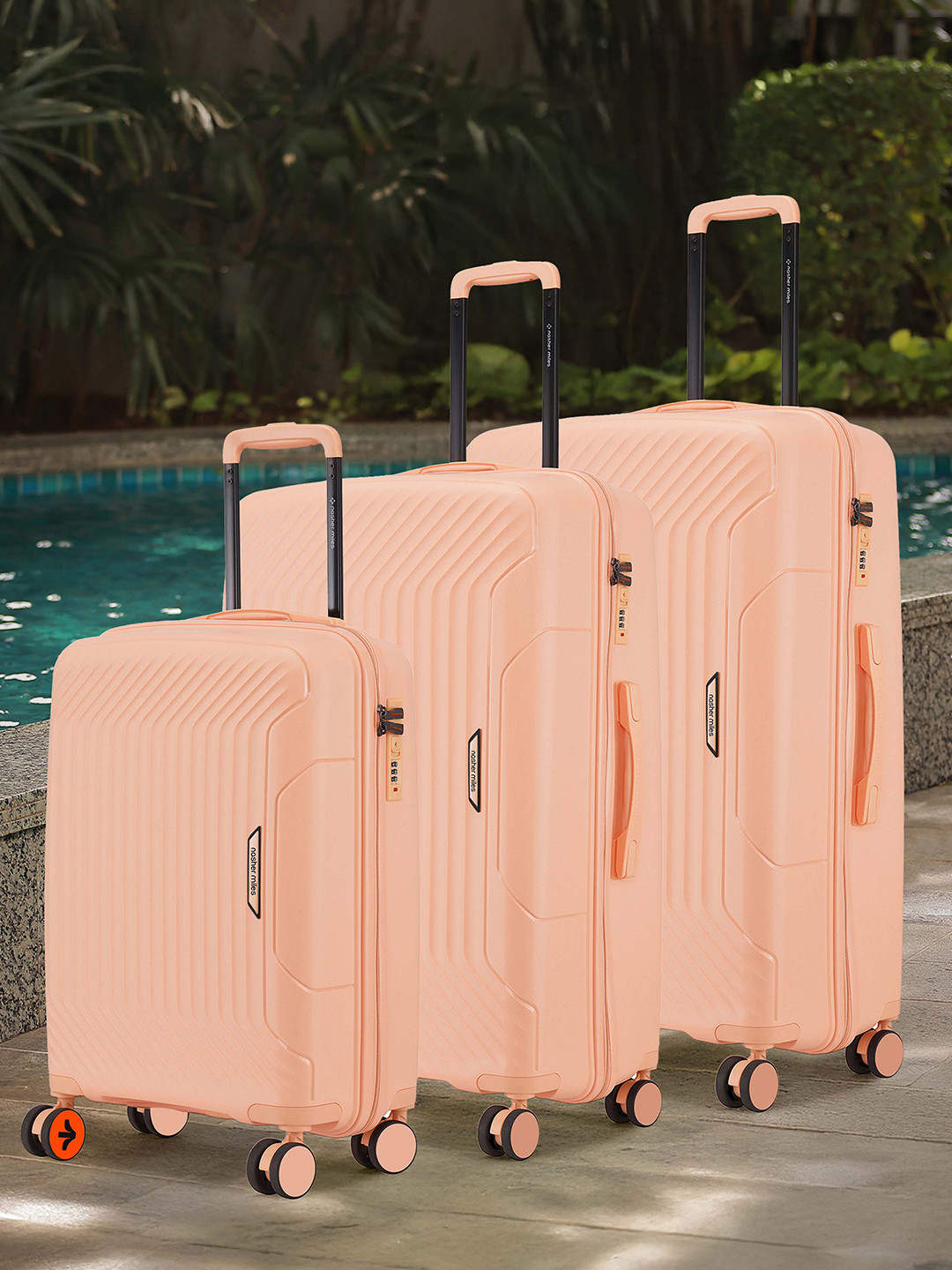 Nasher Miles Coorg Hard-Sided Polypropylene Set of 3 S/M/L Peach Trolley Bags 55-65-75cm