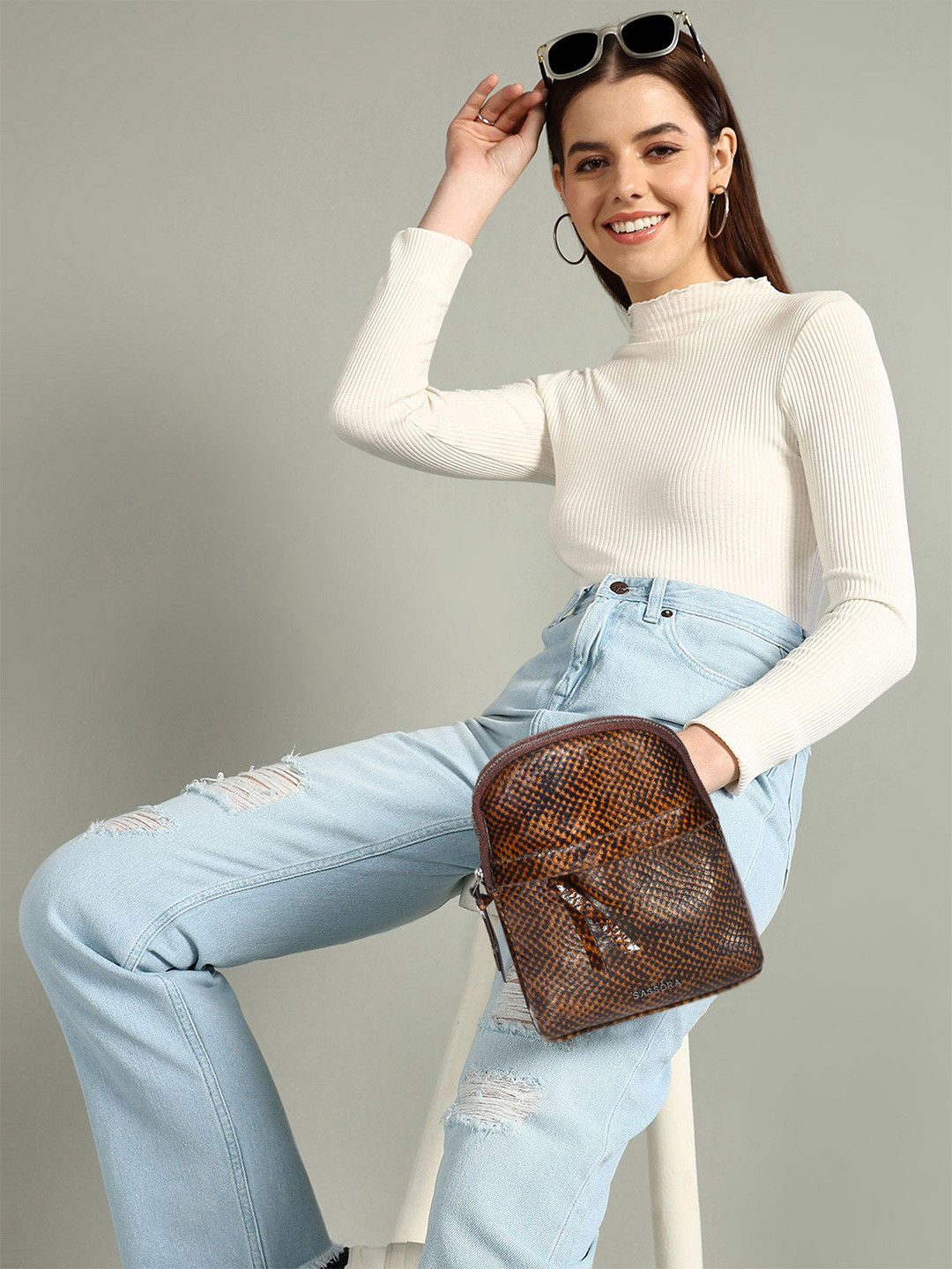 Sassora Women Textured Leather Backpack With Compression Straps