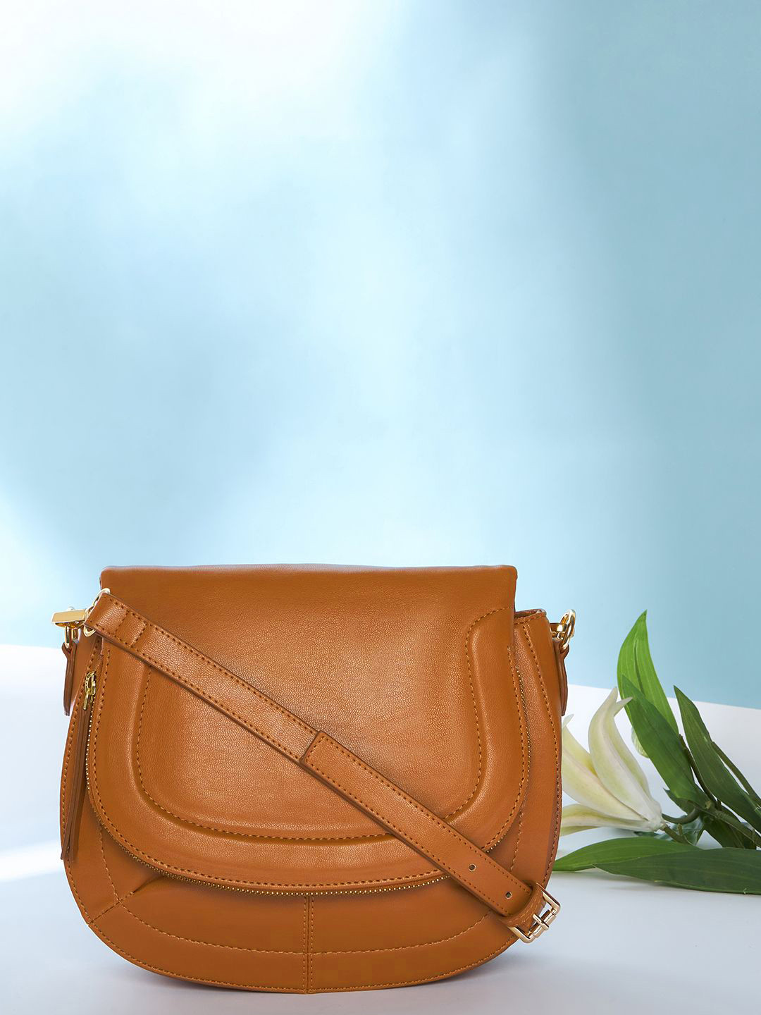 Mast & Harbour Women's PU Half Moon Sling Bag with Tasselled