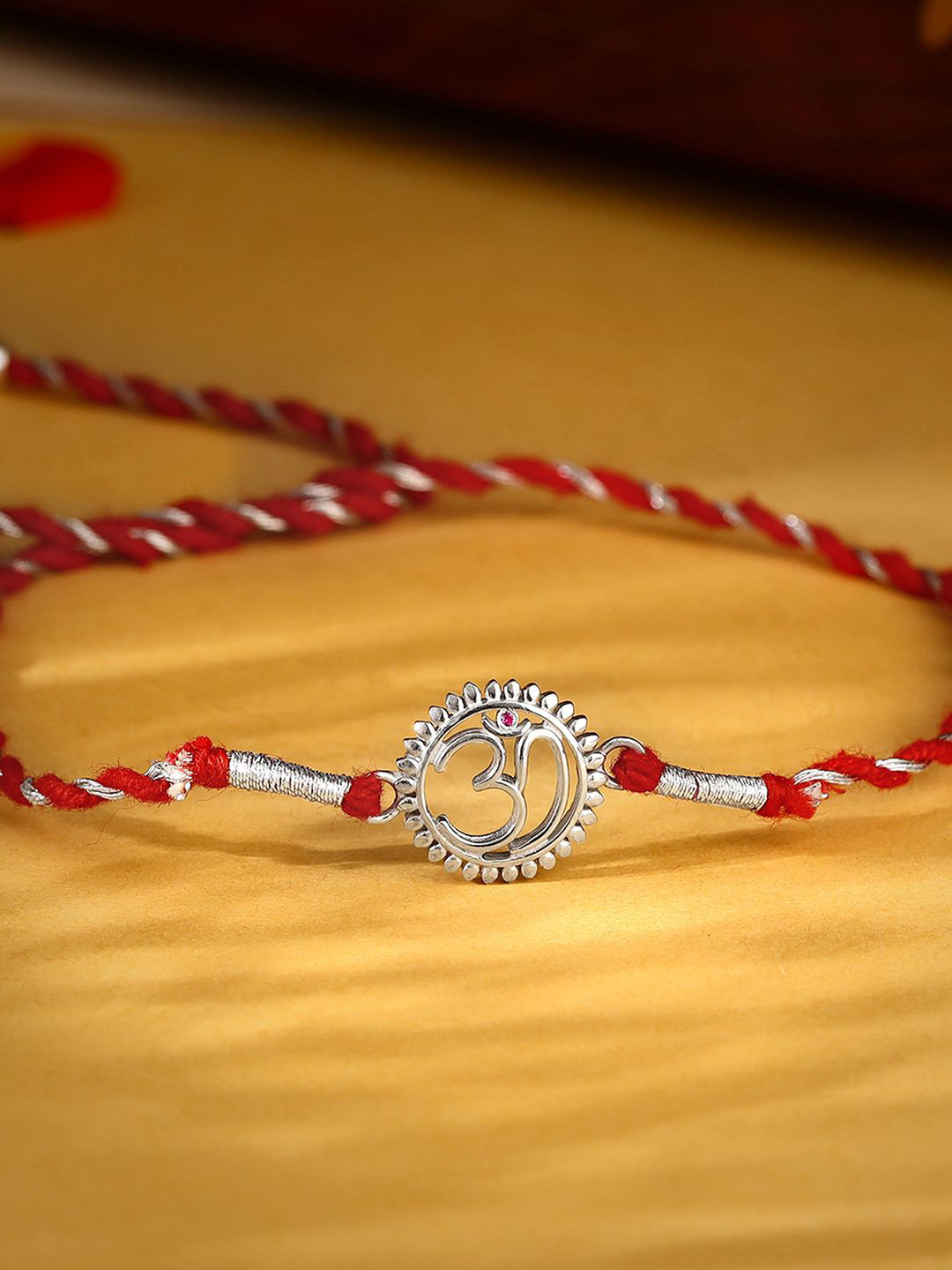 GIVA 925 Silver Om Mandala Rakhi With Roli Chawal