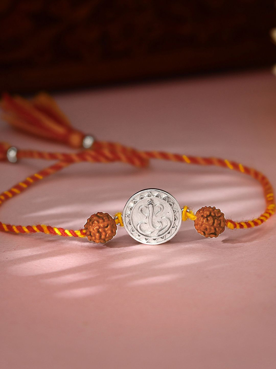 GIVA 925 Silver Gold-Plated Vignesha Rudraksha Thread Rakhi With Roli & Chawal