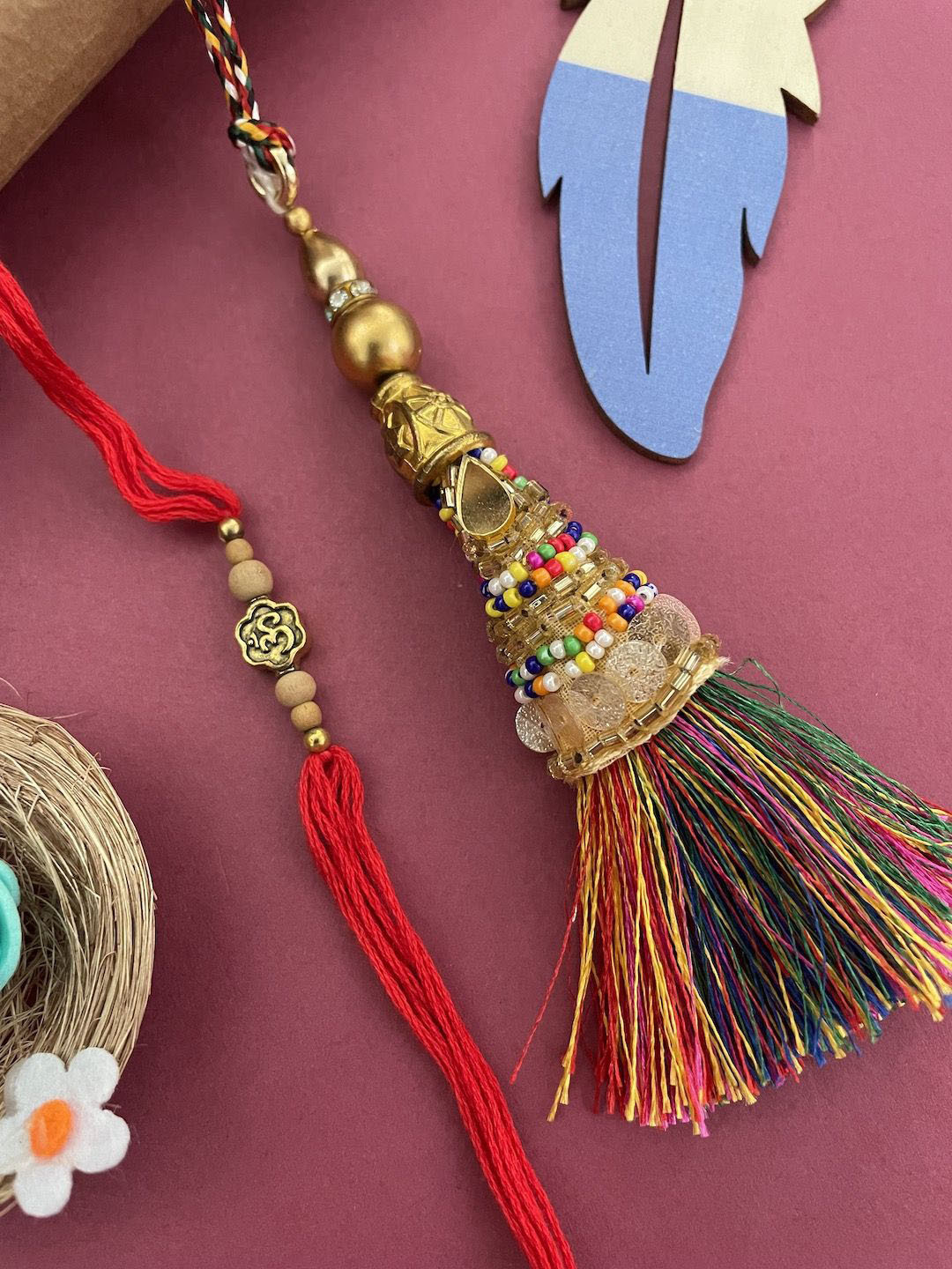 Digital Dress Room Set Of 2 Om Designs & Tassel Lumba Rakhi