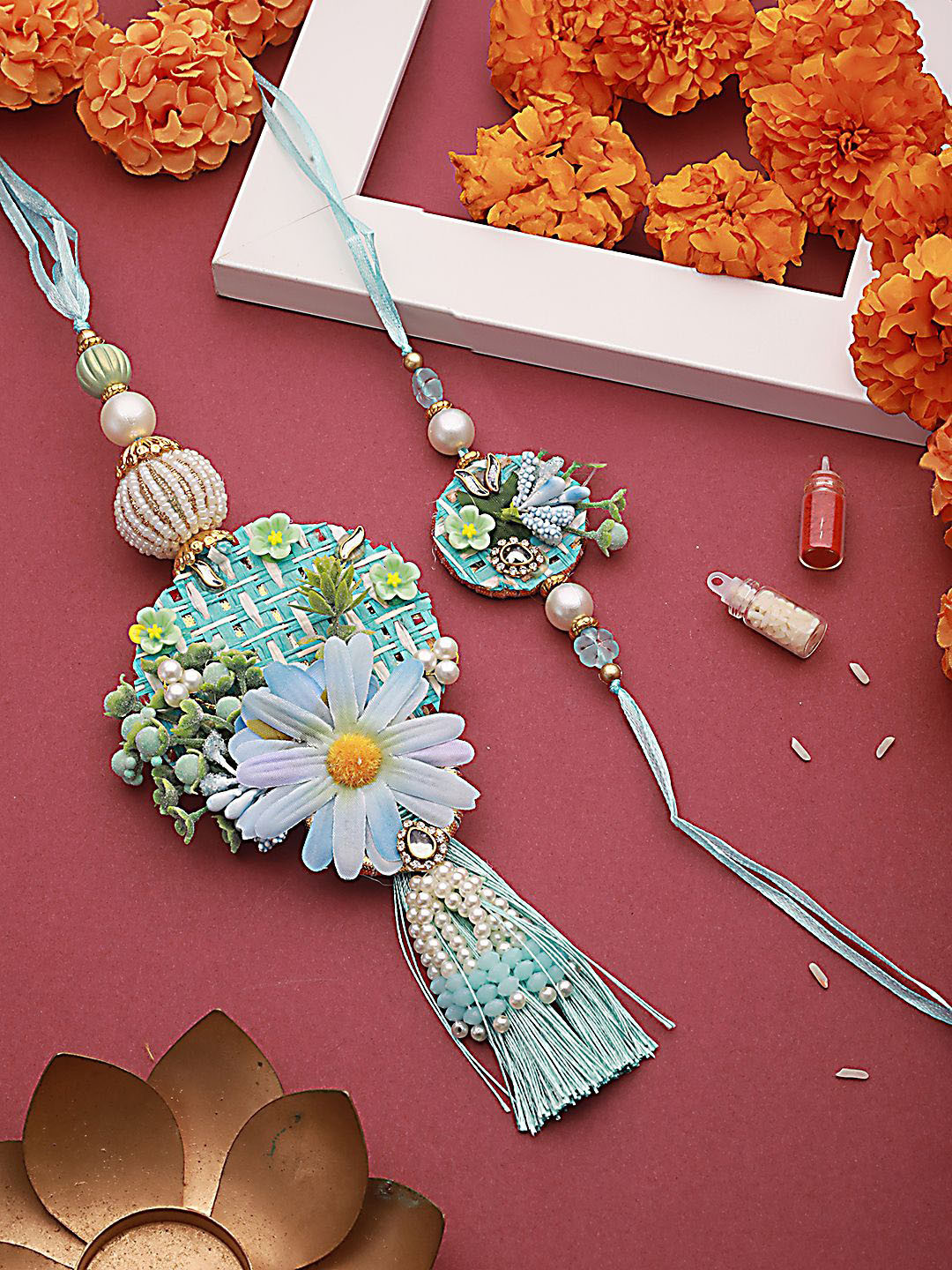 Jazz and Sizzle Floral Work Tasselled Bhaiya Bhabhi Rakhi with Roli & Chawal