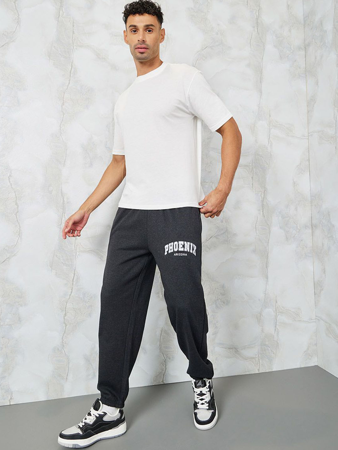 Styli Men Embroidered City Name Relaxed Terry Joggers