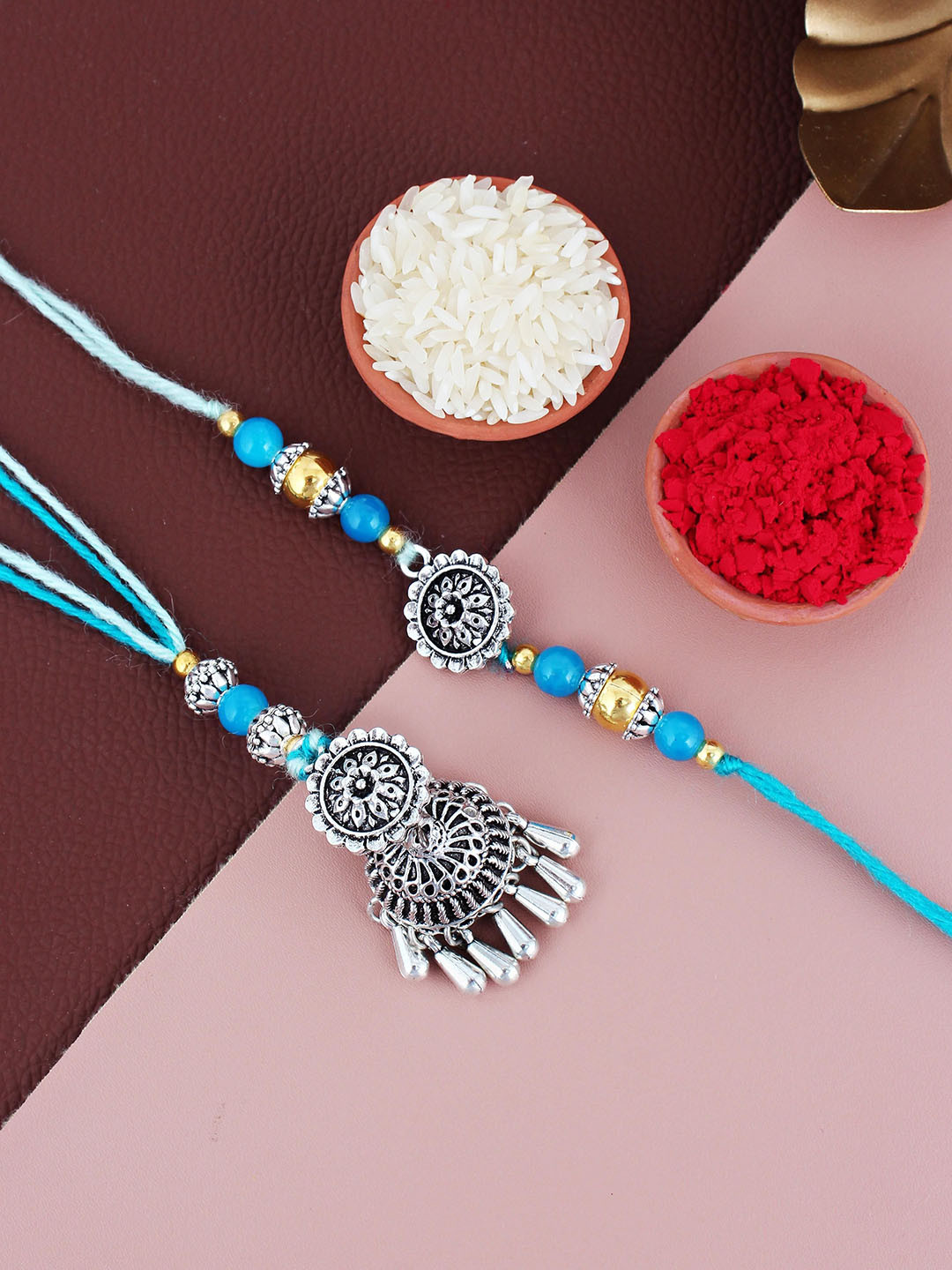 LUCKY JEWELLERY Set Of 2 Oxidised German Silver Lumba & Thread Rakhis With Roli Chawal