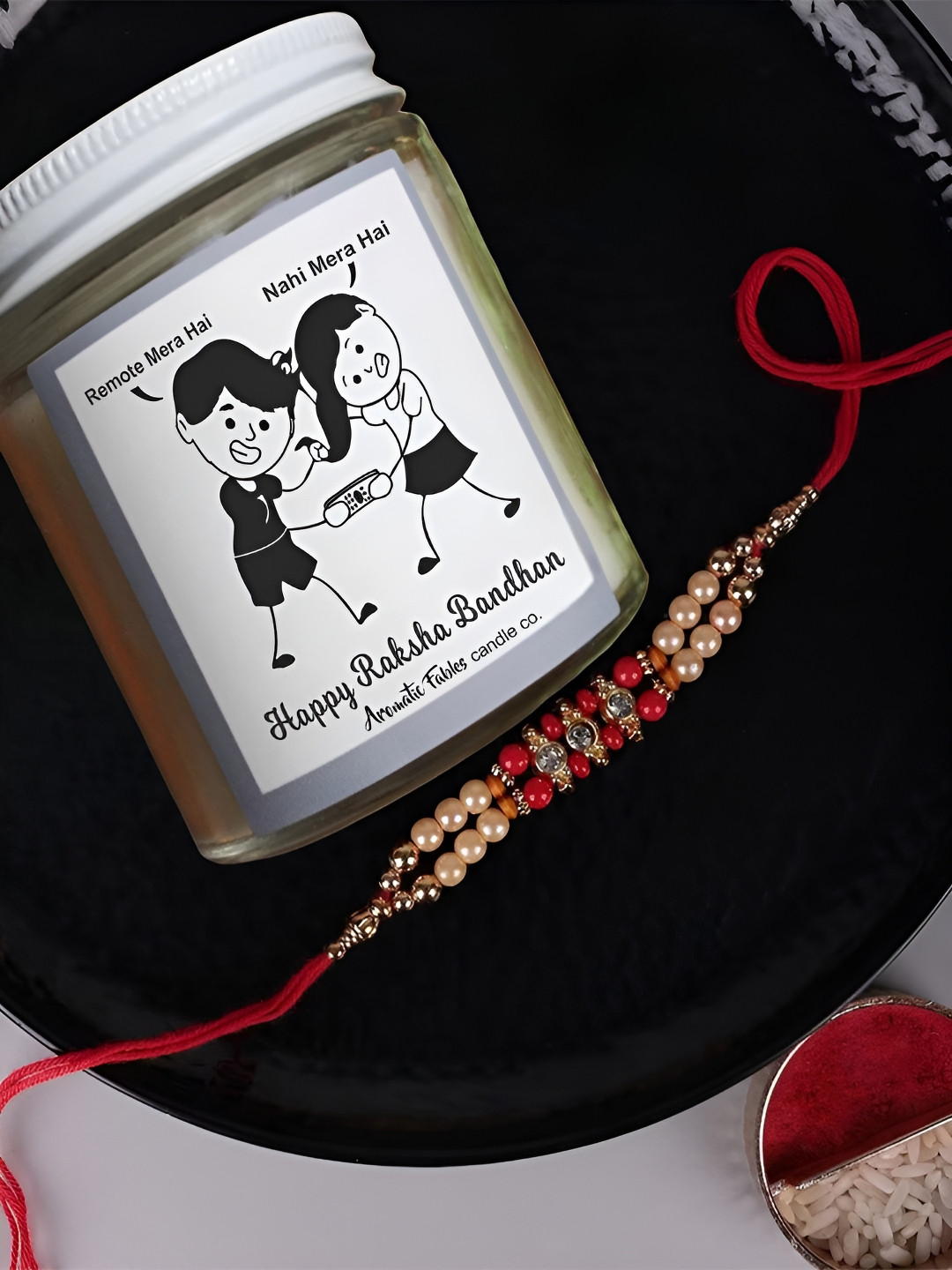 Aromatic Fables Set Of 2 Rakhi With Lavender Scented Sibling Candle & Roli Chawal