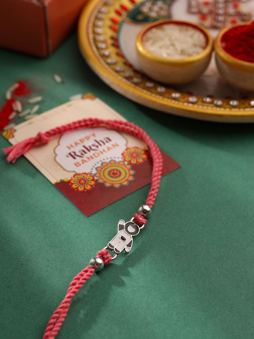 VIRAASI Set of 2 Astronaut Thread Rakhi with Teddy Bear & Roli Chawal