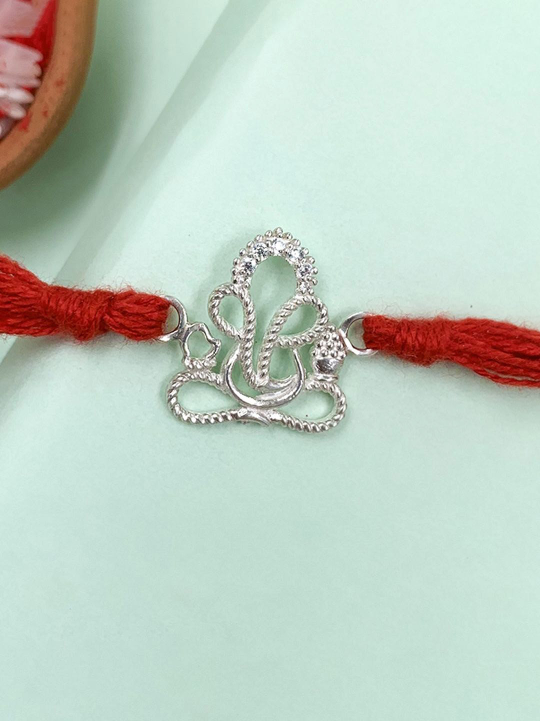 Unniyarcha 92.5 Pure Silver Lord Ganesha Line Thread Rakhi