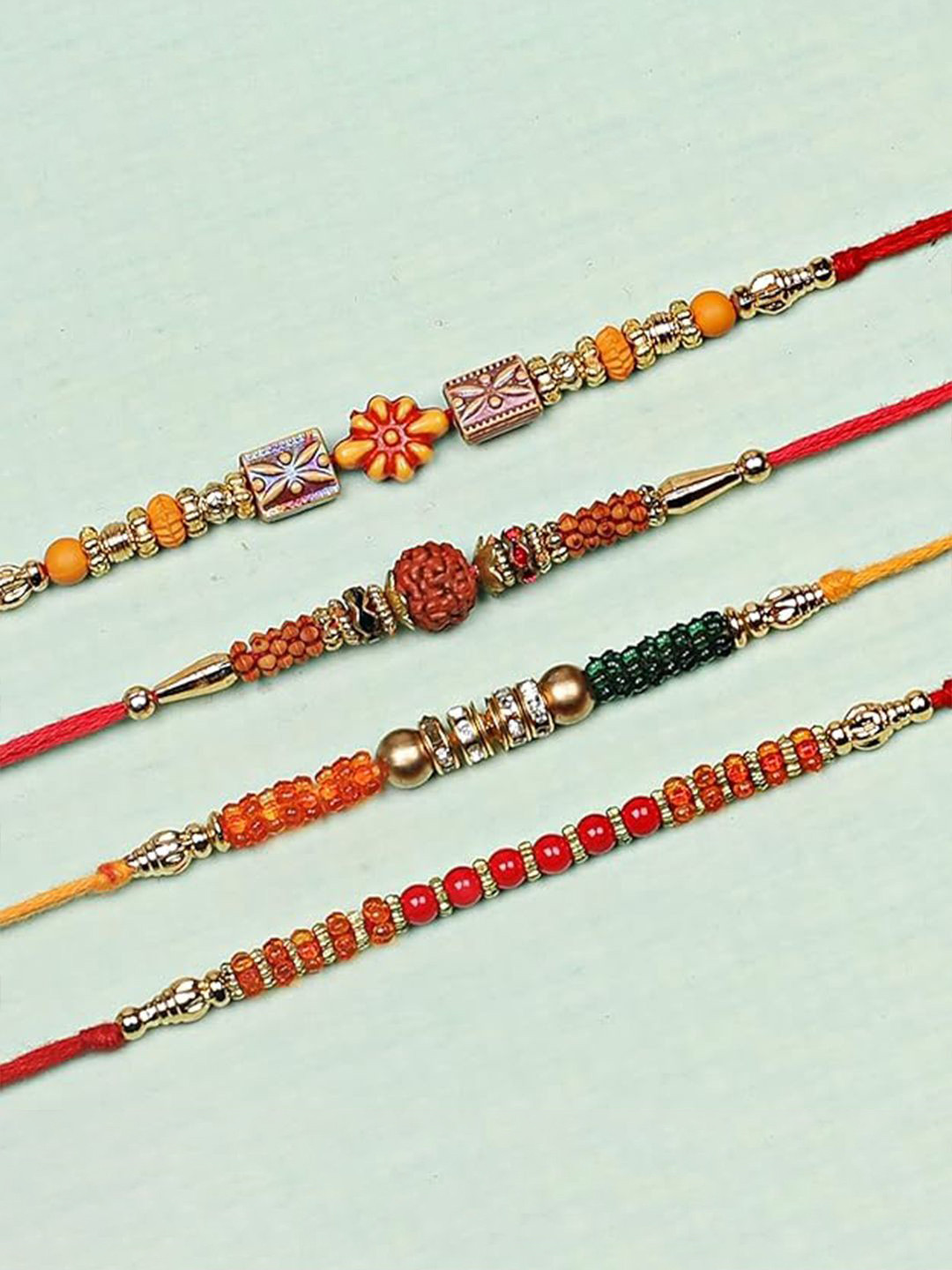 Kaameri Bazaar Set Of 12 Beaded Rakhi With Roli Chawal