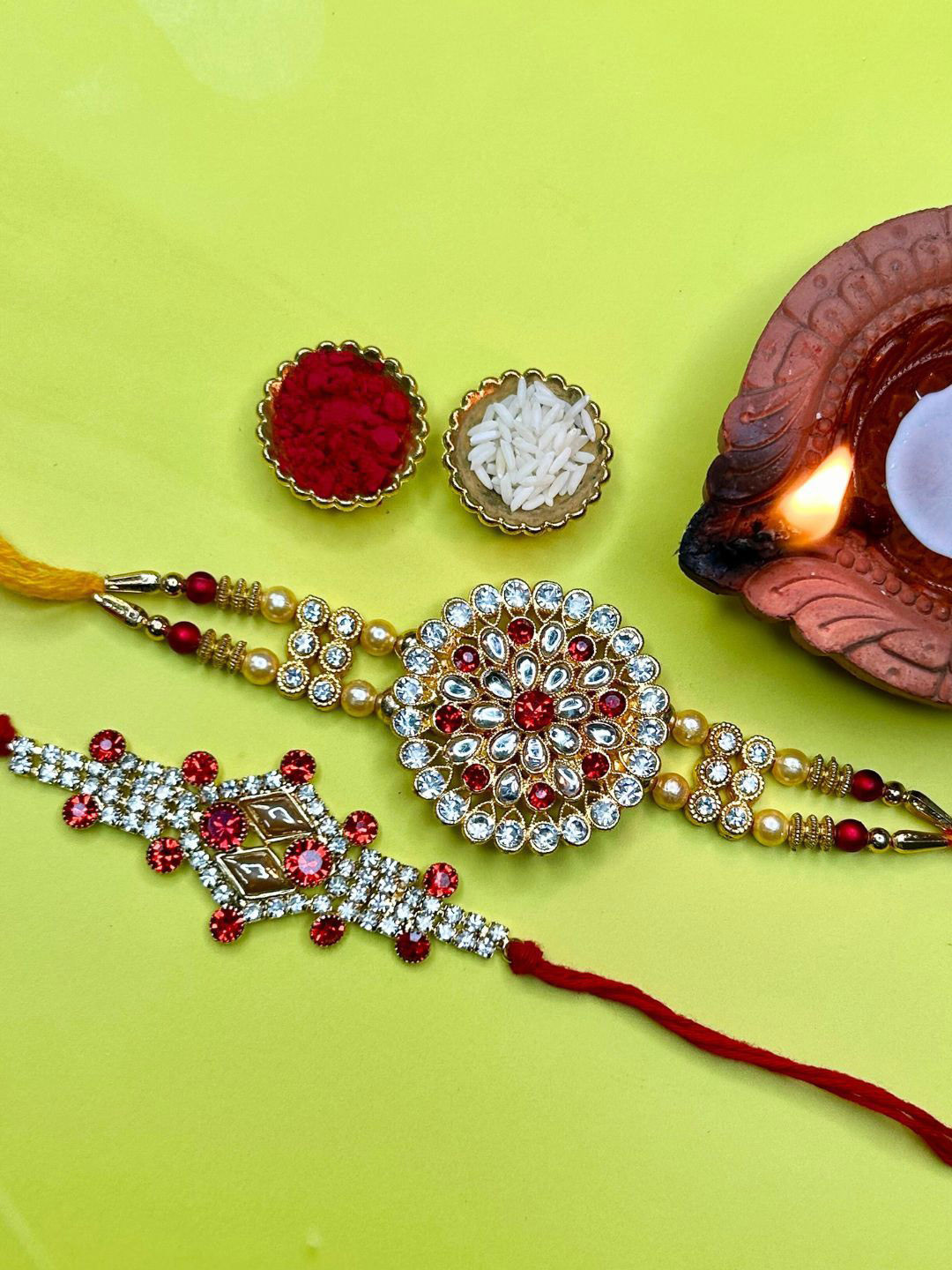LAIDA Sugreev and Indrajit Set Of 2 Kundan Studded Floral Rakhi With Roli & Chawal