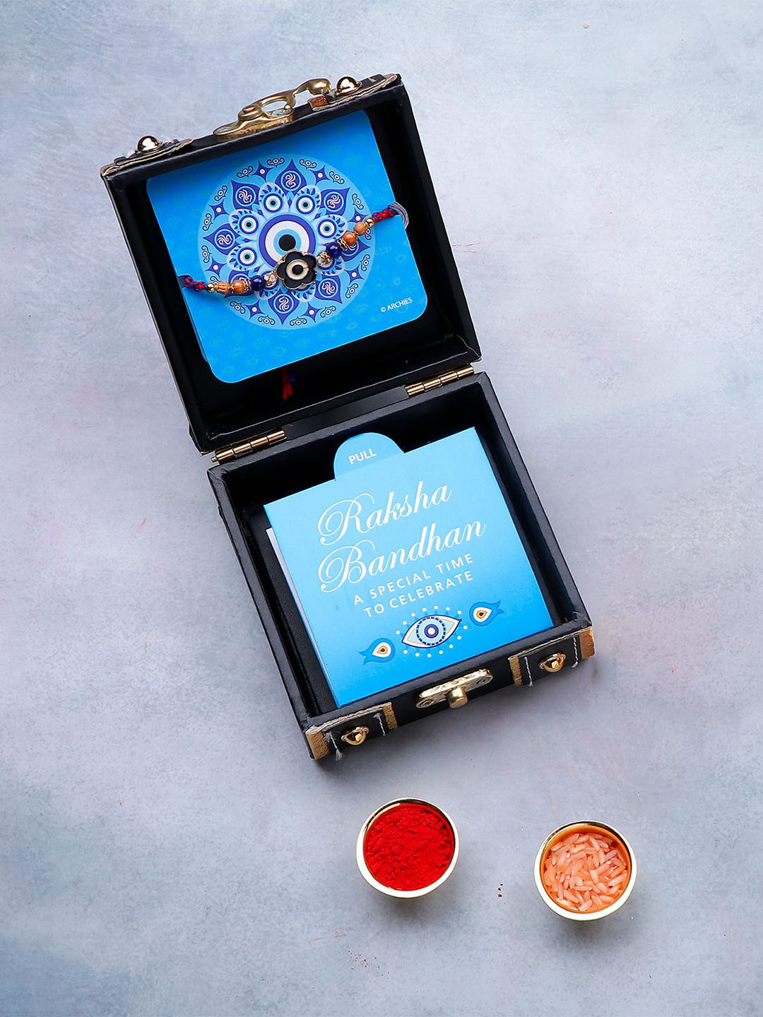 Archies Evil Eye Beaded Rakhi in Trunk Box With Roli Chawal & Greeting Card