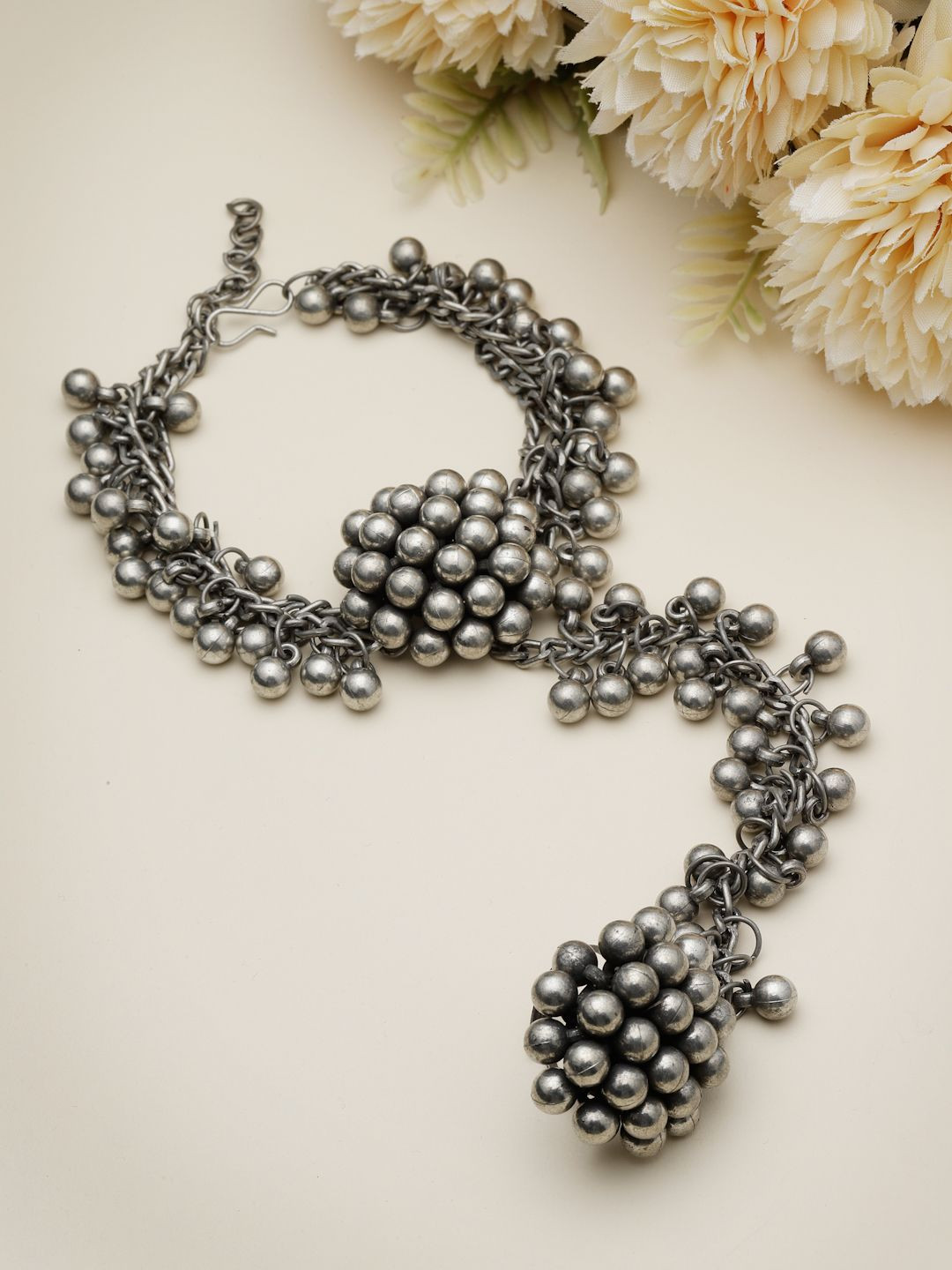 Moedbuille Silver-Plated Ghungroo Studded Tribal Design Oxidised Wraparound Bracelet