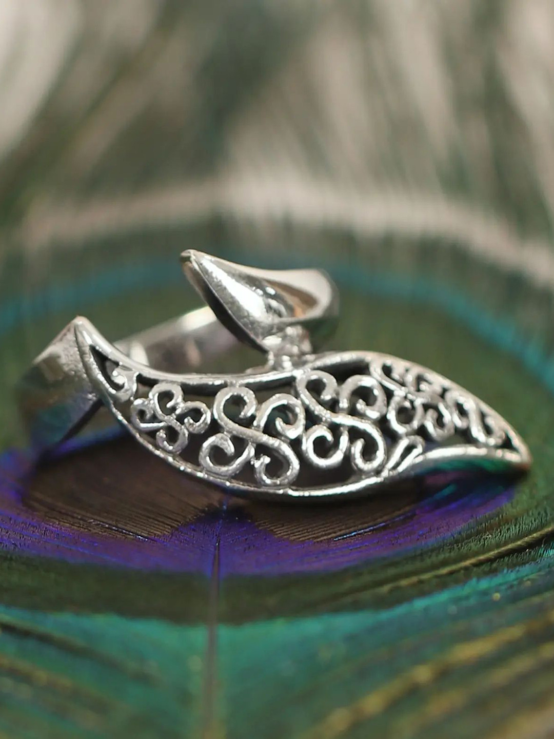 Exotic India Sterling Silver Leaf Shaped Adjustable Ring
