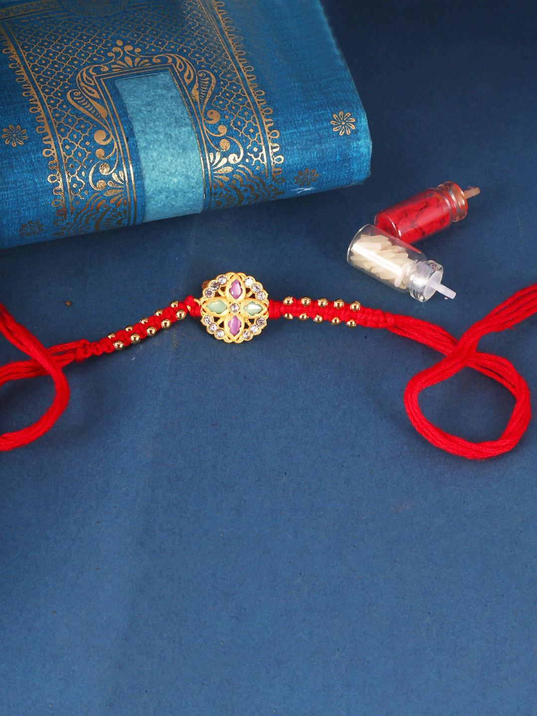 Vighnaharta Gold and Rhodium Plated Cubic zirconia Studded Thread Rakhi