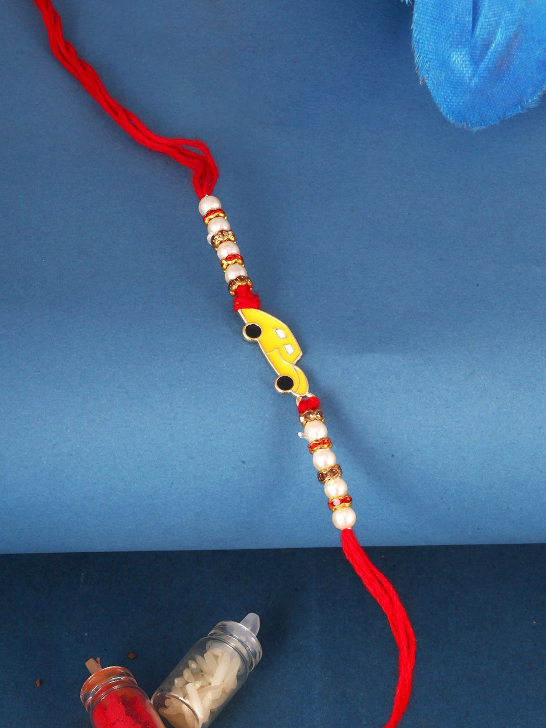 Vighnaharta Gold and Rhodium Plated Car Beaded Thread Rakhi