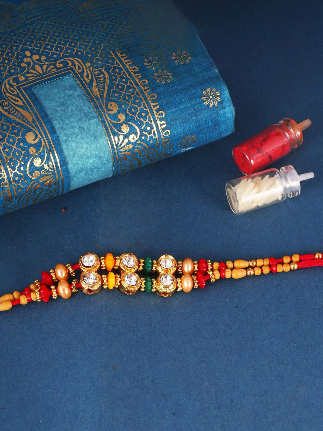 Vighnaharta Gold and Rhodium Plated Cubic zirconia Studded Thread Rakhi