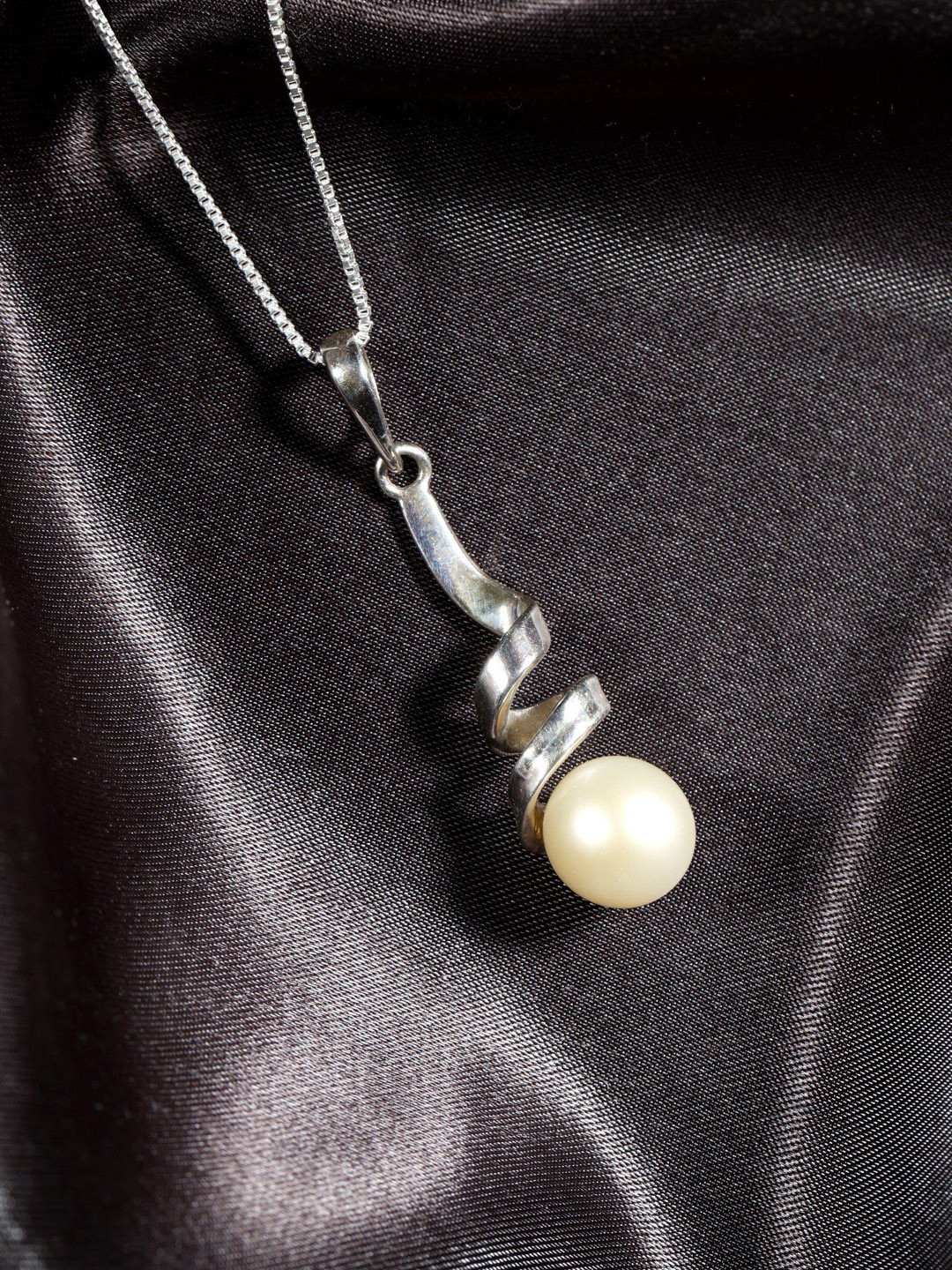 Exotic India Pearl Sterling Silver Twisted Pendant