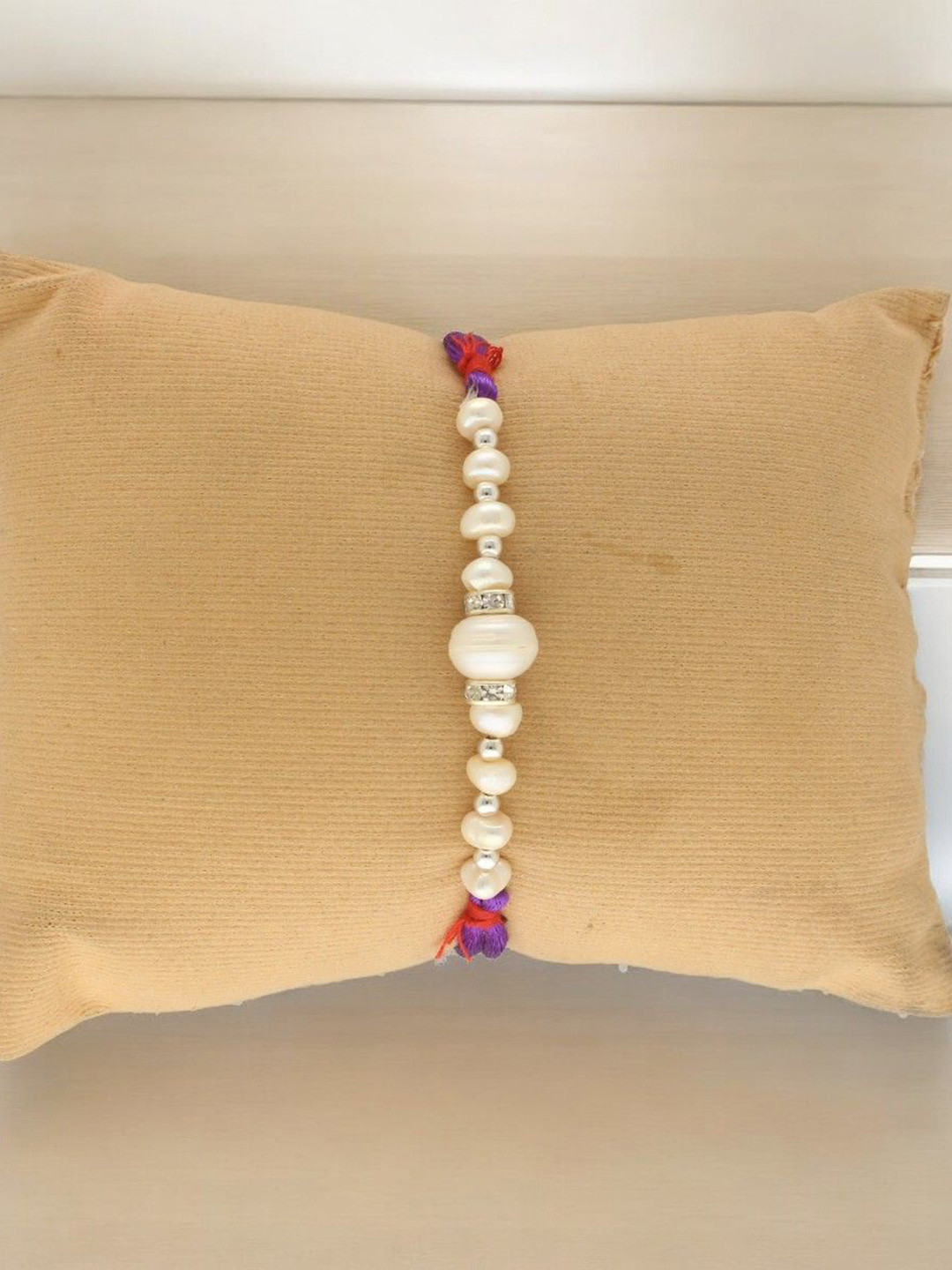 Sri Jagdamba Pearls Dealer Fresh Water Pearl Beaded Thread Rakhi