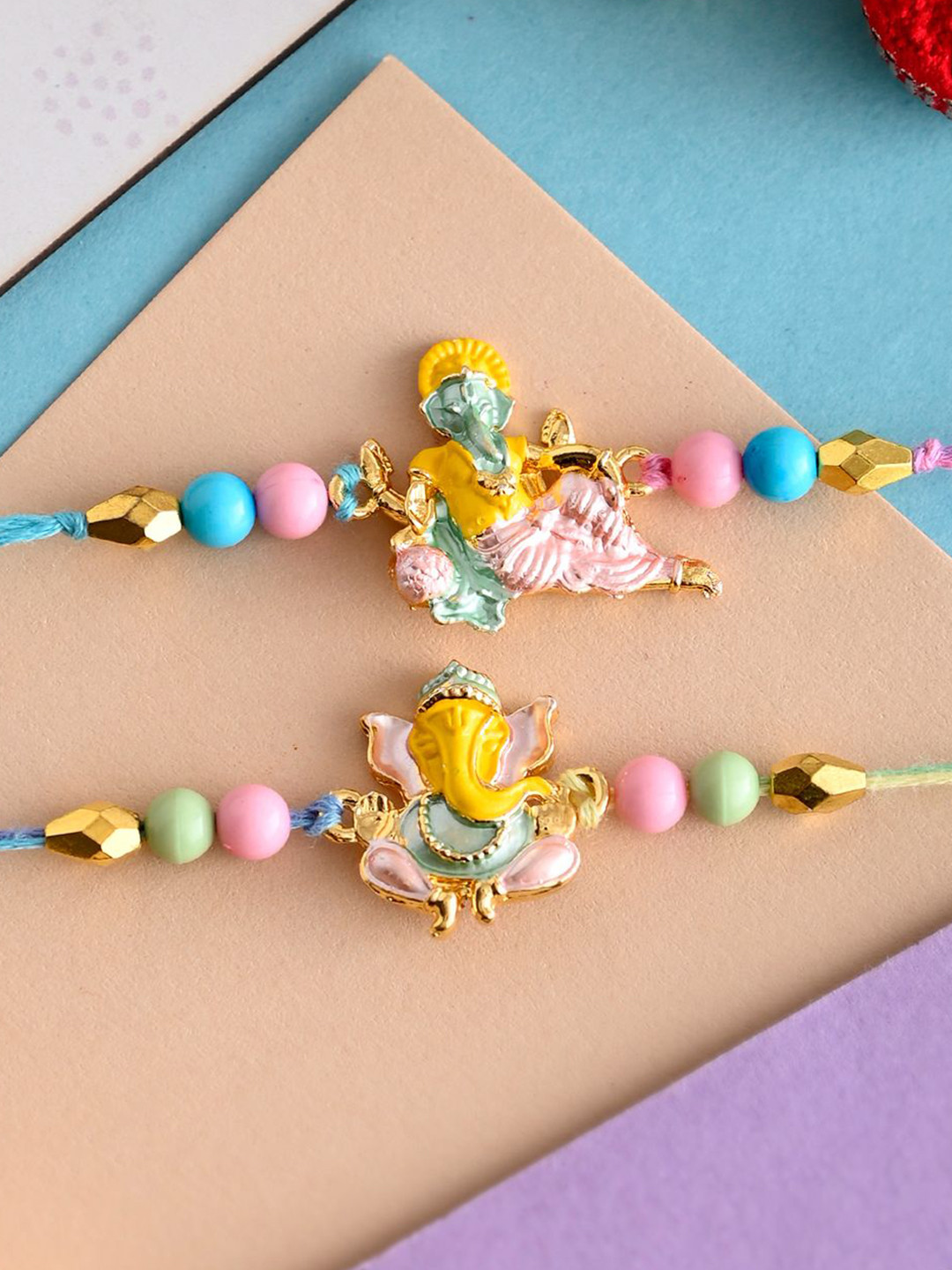 Ascension Set Of 2 Beaded Ganesh Charm Rakhi & Roli Chawal