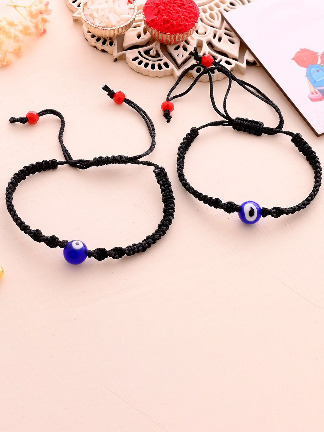 Ascension Set of 2 Evil Eye Rakhis With Roli Chawal
