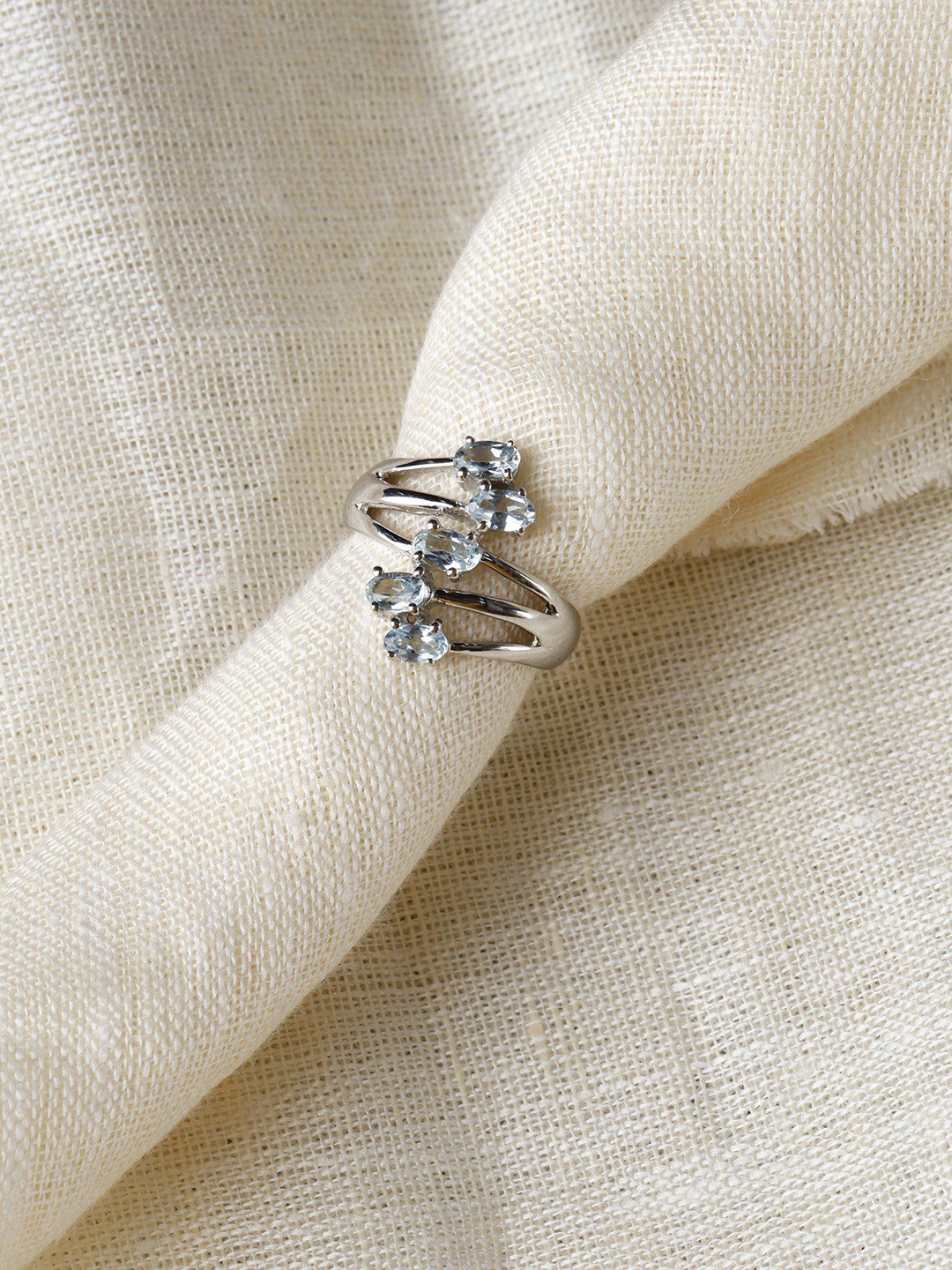 Exotic India Faceted Blue Topaz Sterling Silver Designer Ring