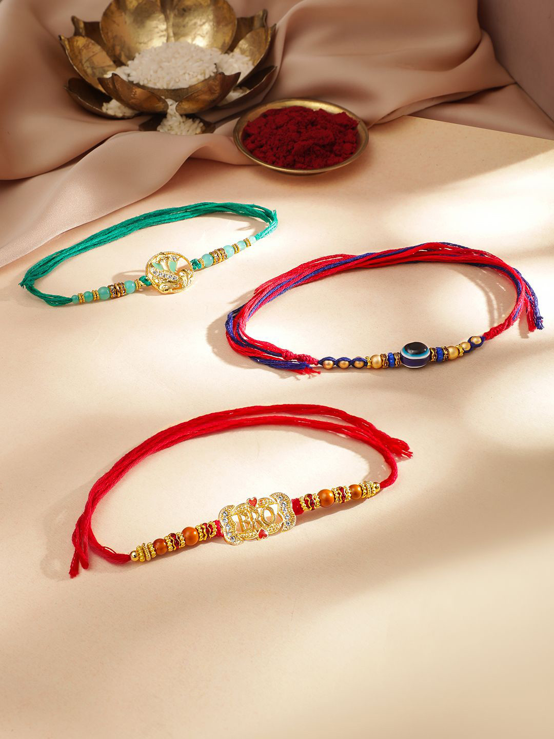 Rubans Set of 3 Bro Code Ganesha And Evil Eye Motif Beaded Rakhi