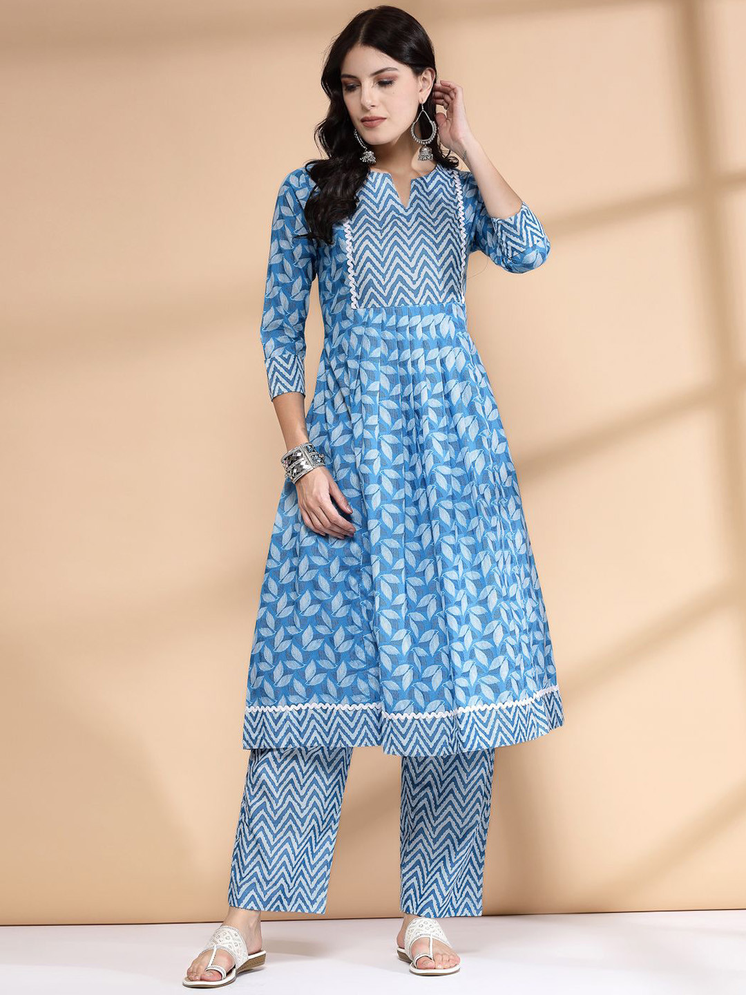 LARGISH Floral Printed Notch Neck Cotton Box Pleated A-Line Kurta With Trousers