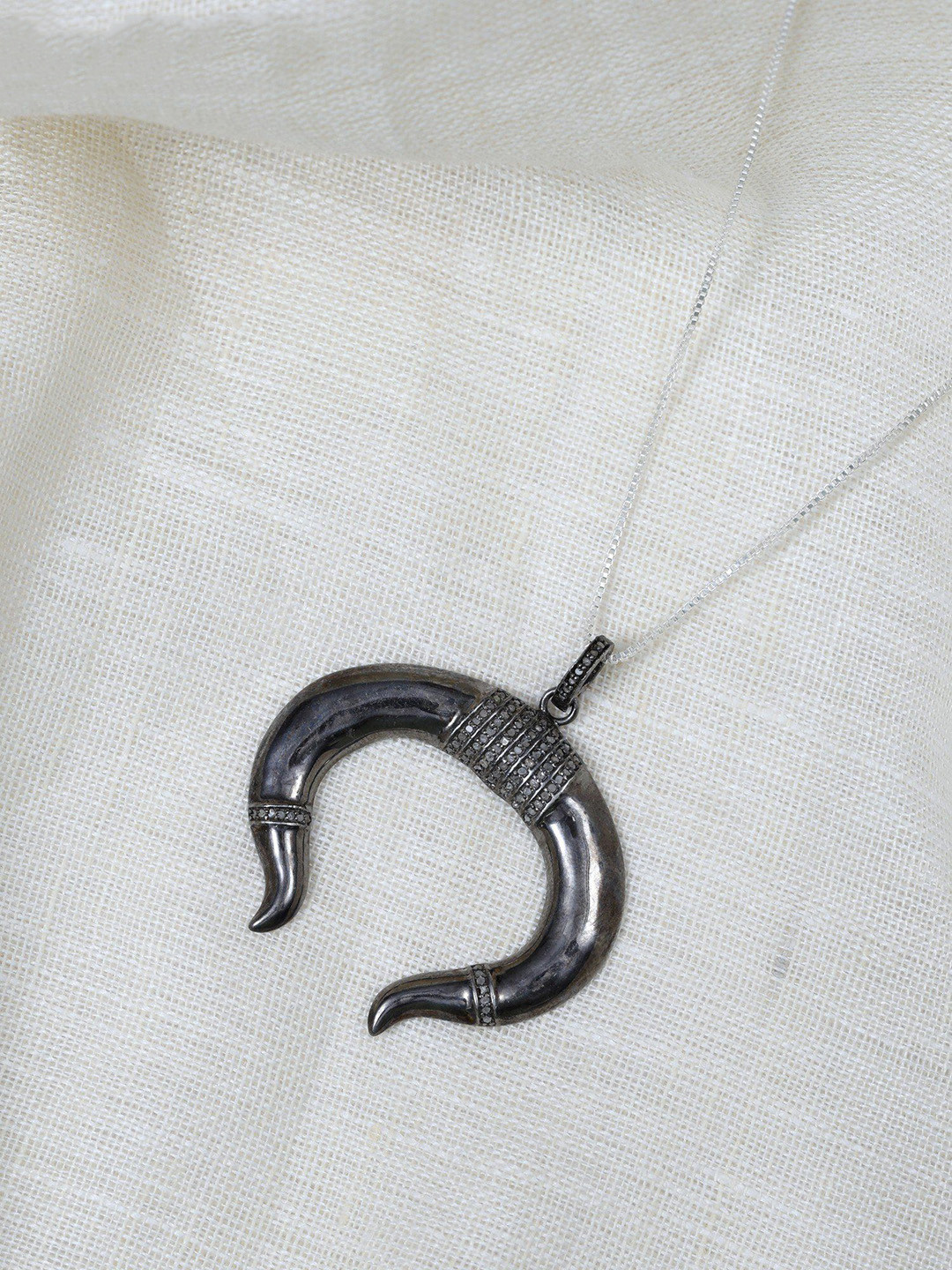 Exotic India Sterling Silver Bull Horn Pendant