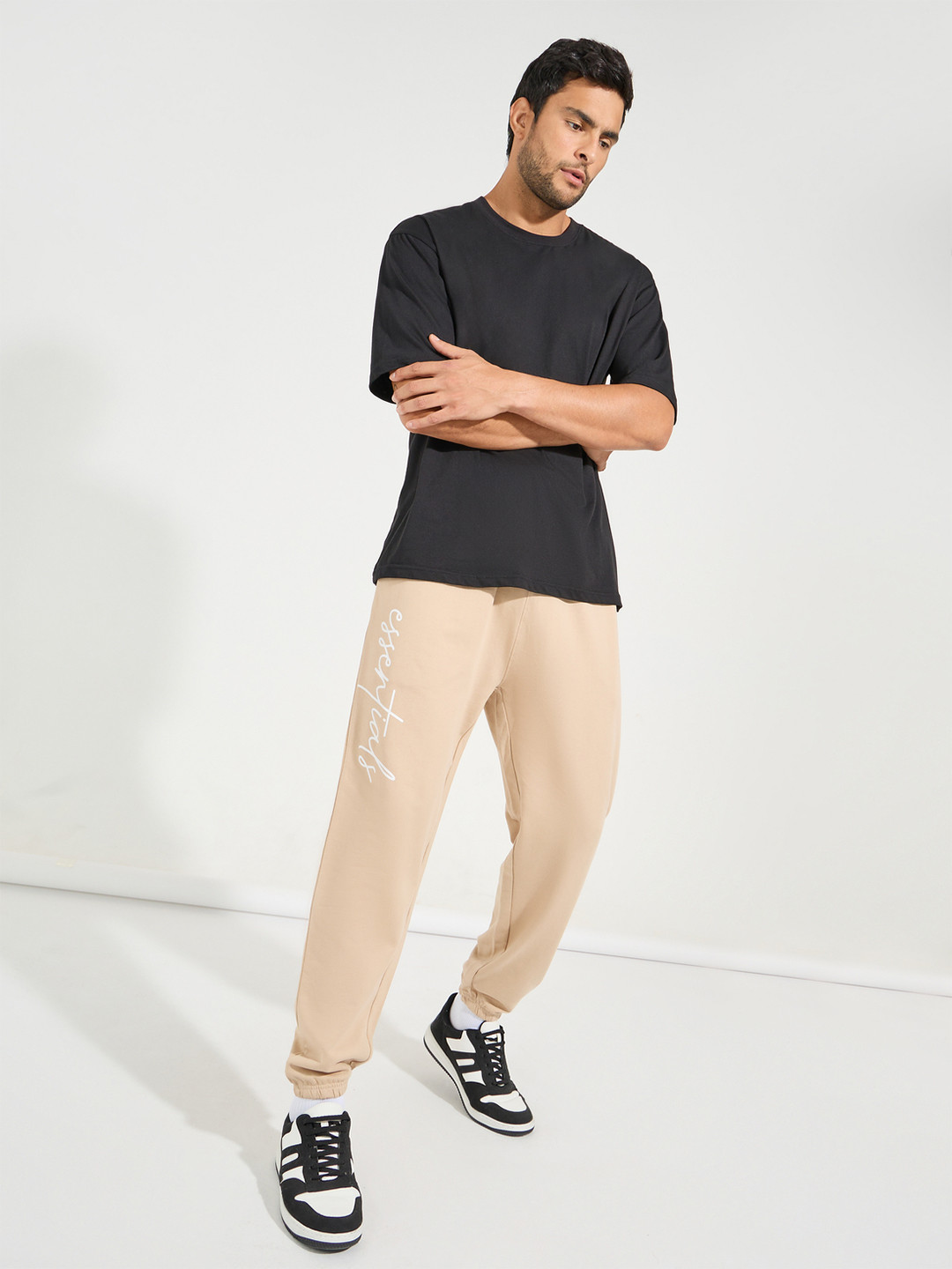 Styli Men Beige Slogan Typography Printed Oversized Fit Pure Cotton Joggers