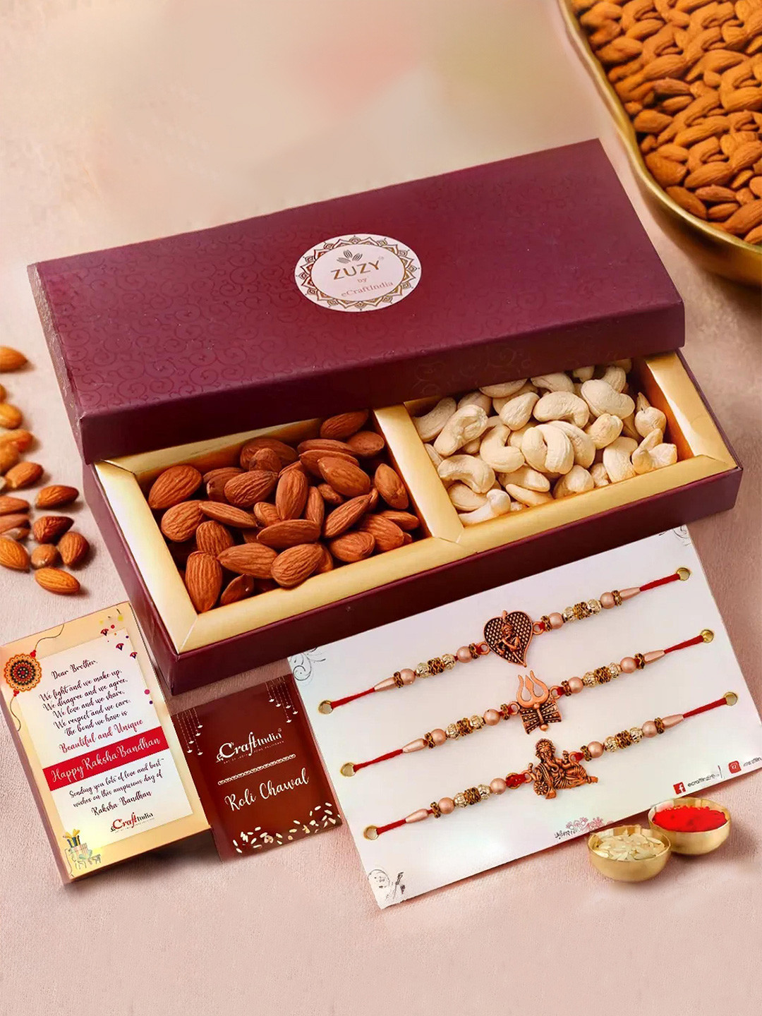 eCraftIndia Set of 4 Designer Rakhis With Zuzy Dried Fruit Box and Roli Chawal Pack