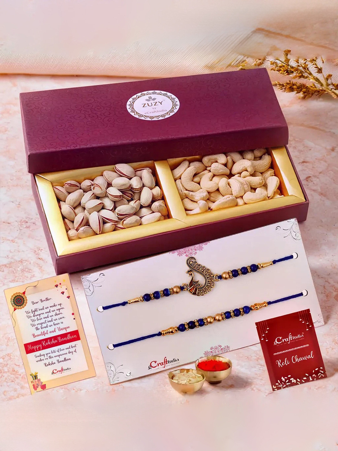 eCraftIndia Set of 3 Designer Rakhis With Zuzy Dried Fruit Box and Roli Chawal Pack