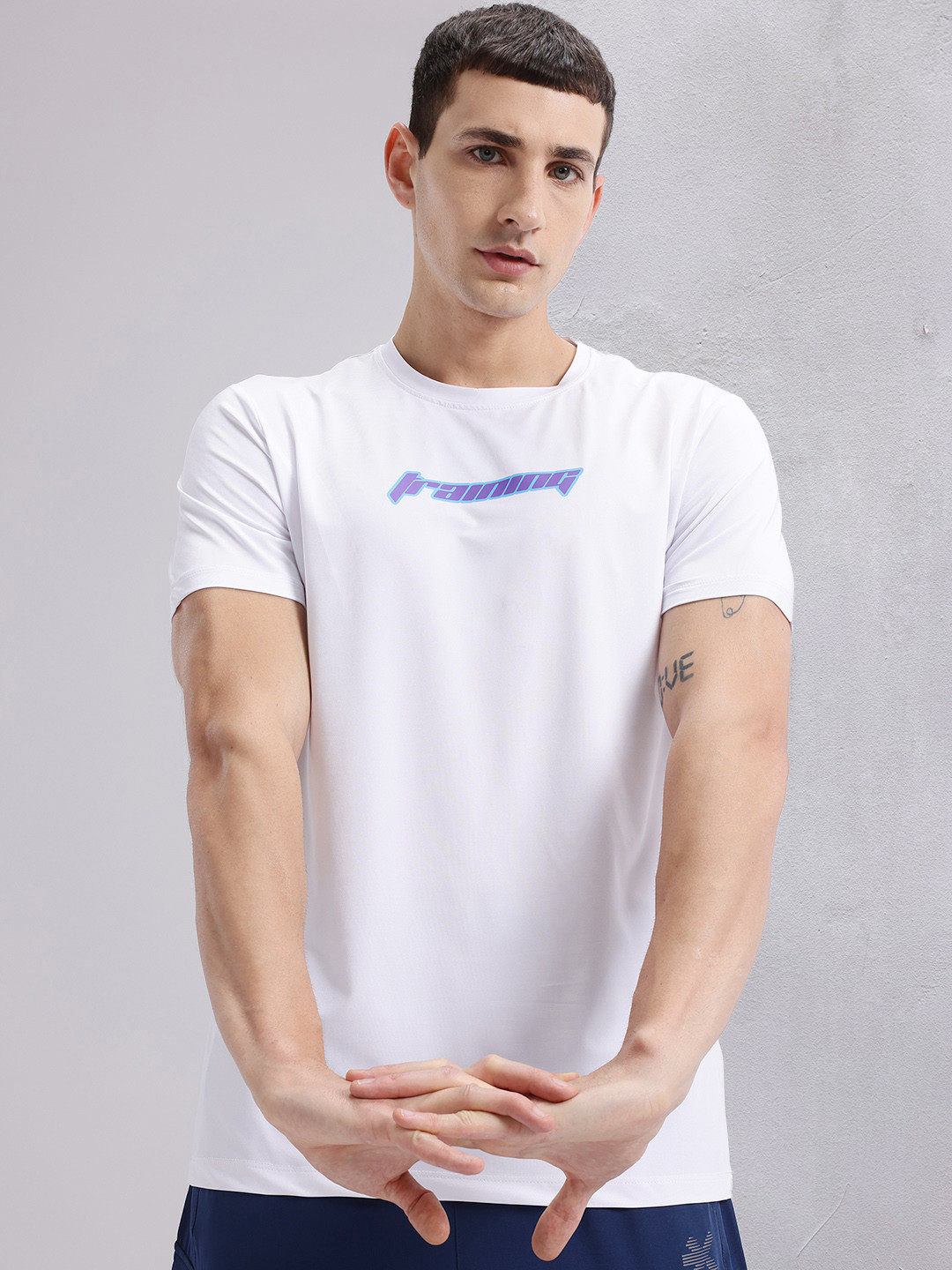 HRX by Hrithik Roshan Solid Running T-shirt with Typography Detail