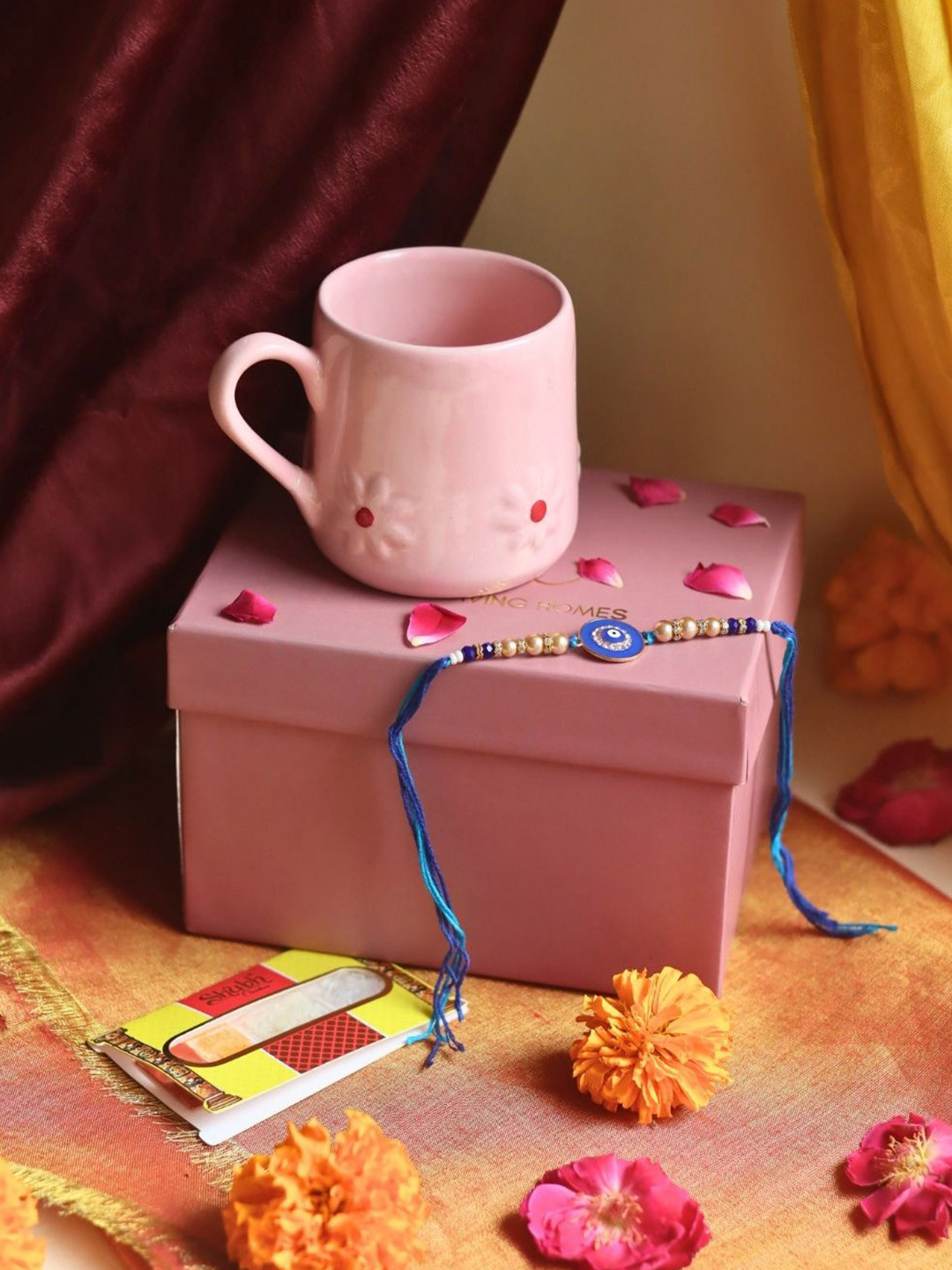 WEAVING HOMES Set Of 1 Rakhi With Pink lily Mug