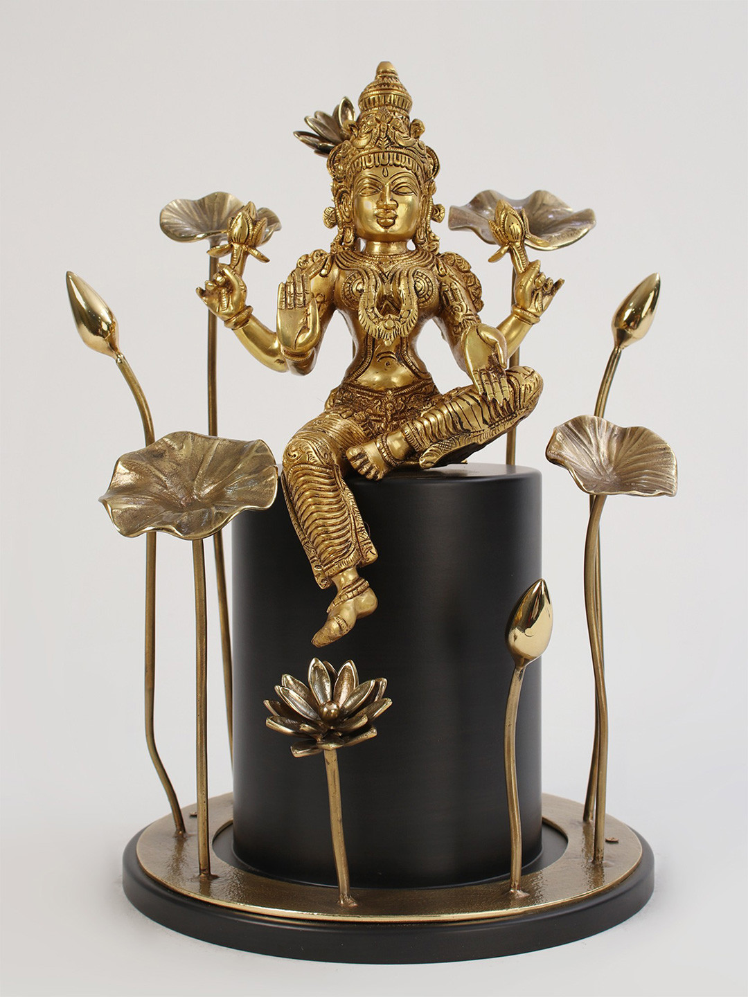 Exotic India Lakshmi Seated on Pedestal Gold Brass Metallic Prayer Room Large Showpiece - 11 Inches