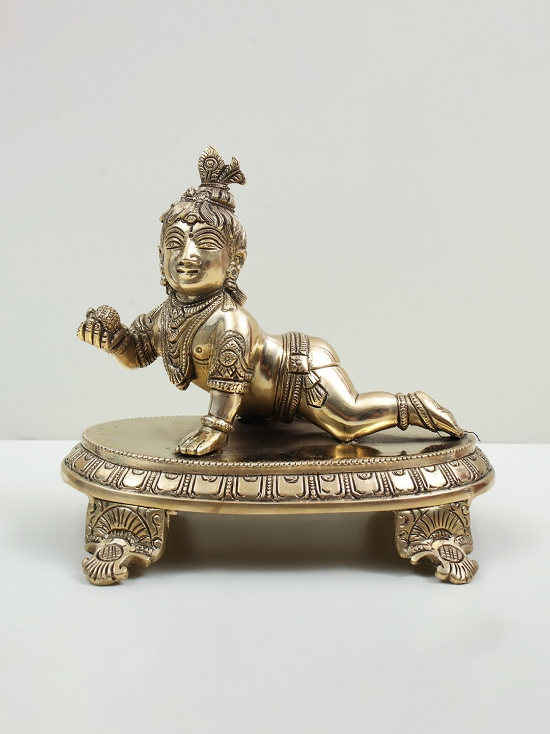 Exotic India Laddu Gopal Gold Brass Metallic Prayer Room Small Showpiece - 4.8 Inches