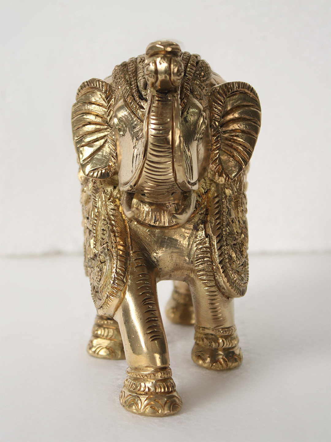 Exotic India Elephant with Lord Ganesha Gold Brass Metallic Prayer Room Small Showpiece - 4.7 Inches