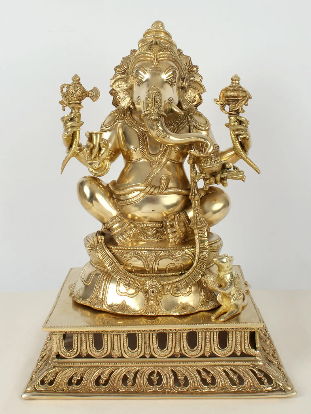 Exotic India Sitting Chaturbhuja Lord Ganesha Gold Brass Metallic Prayer Room Large Showpiece - 19.8 Inches