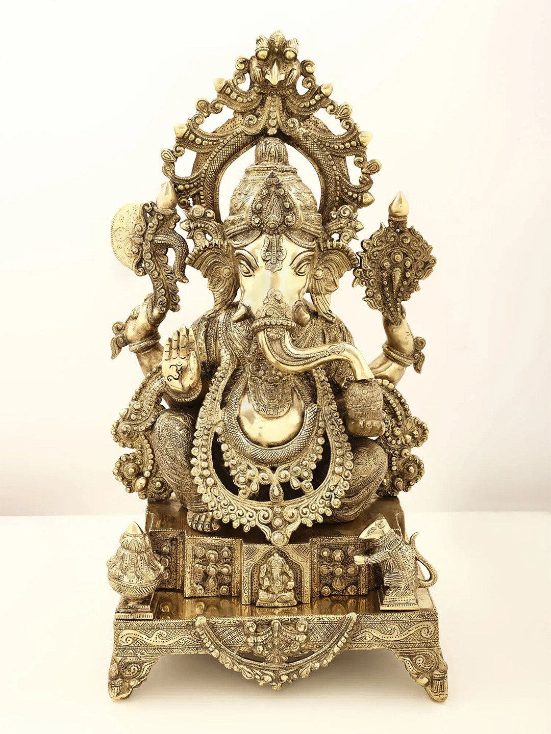 Exotic India Enthroned Ganesha Gold Brass Metallic Prayer Room Hand Made Extra Large Showpiece - 26.5 Inches