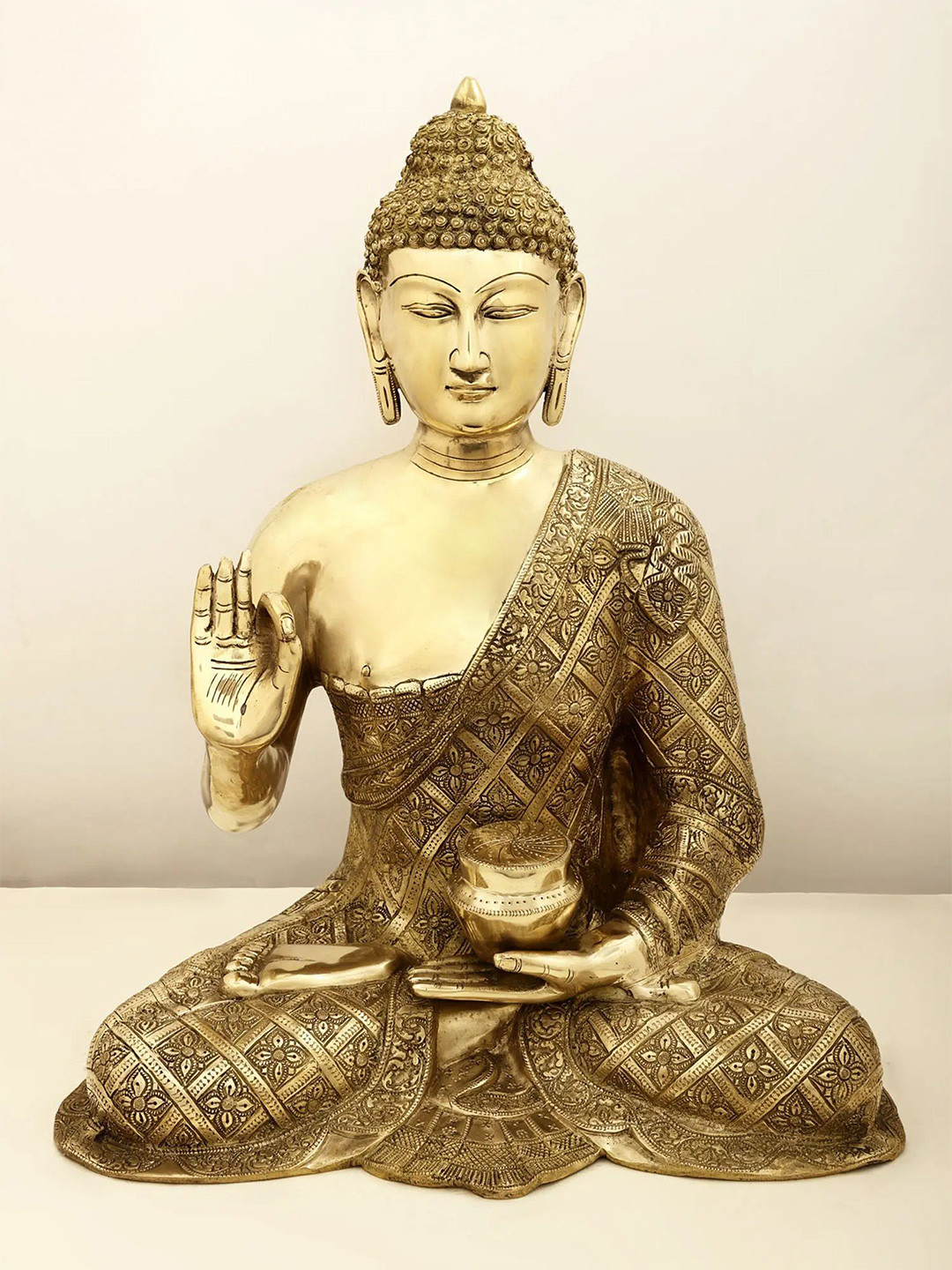 Exotic India The Stately Buddha Gold Brass Metallic Prayer Room Hand Made Large Showpiece - 23 Inches