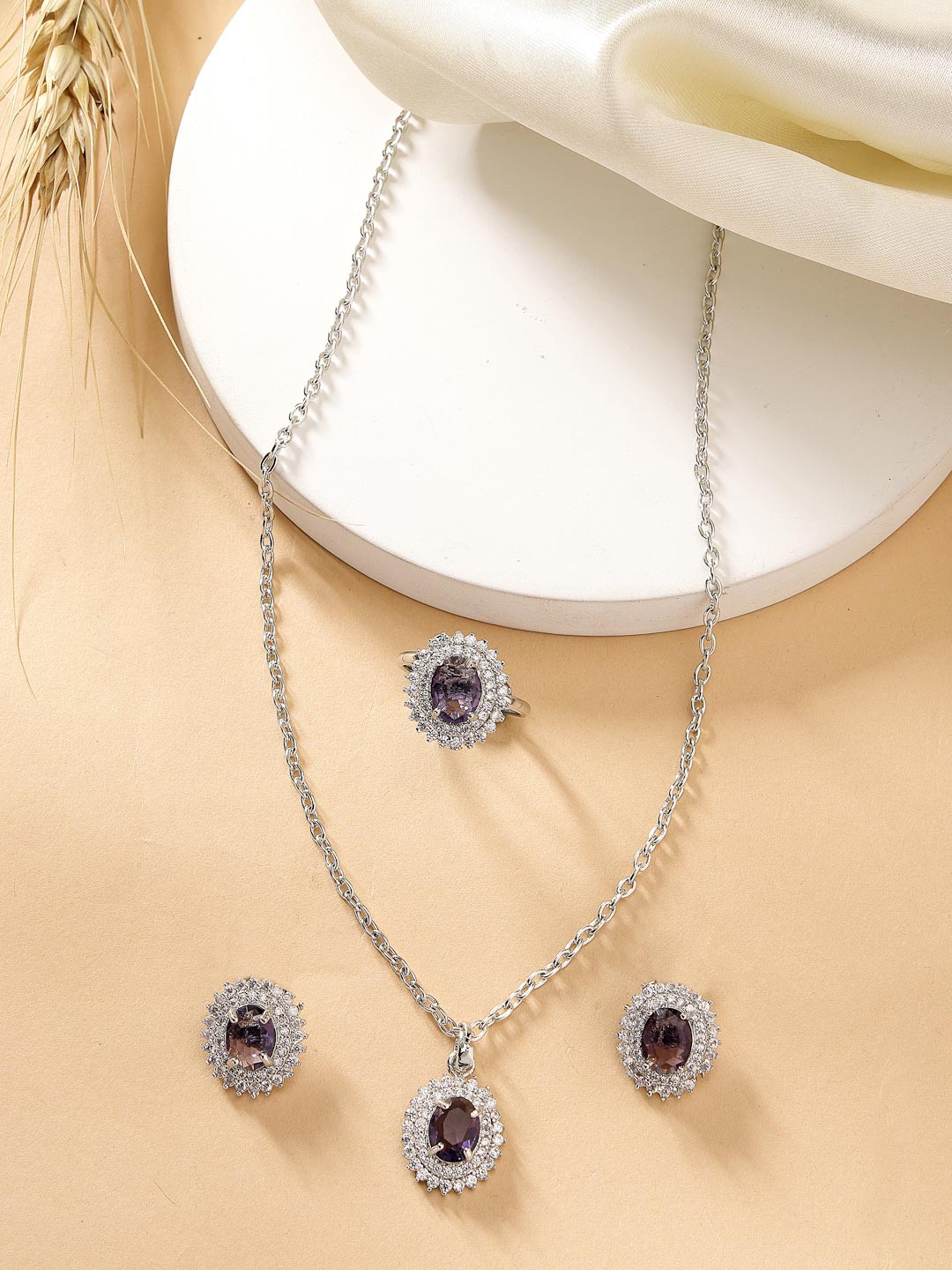 ZENEME Rhodium Plated Silver toned Purple AD Studded Pendant Set with Earrings & Ring