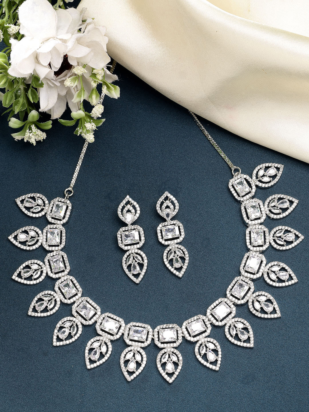 ZENEME Rhodium Plated American Diamond Studded Leaf Style Necklace and Earrings